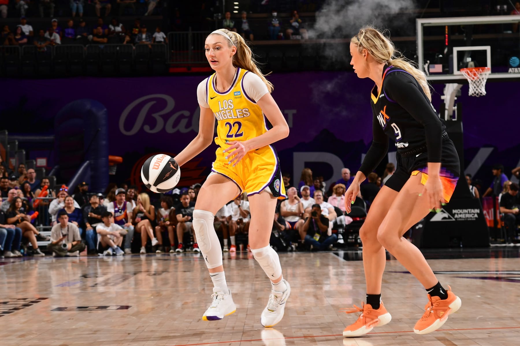 PHOENIX, AZ - JUNE 2:  Sophie Cunningham #9 of the Phoenix Mercury plays defense during the game  against Cameron Brink #22 of the Los Angeles Sparks during a 2024 Commissioner's Cup game on June 2, 2024 at Footprint Center in Phoenix, Arizona. NOTE TO USER: User expressly acknowledges and agrees that, by downloading and or using this photograph, user is consenting to the terms and conditions of the Getty Images License Agreement. Mandatory Copyright Notice: Copyright 2024 NBAE (Photo by Kate Frese/NBAE via Getty Images)
