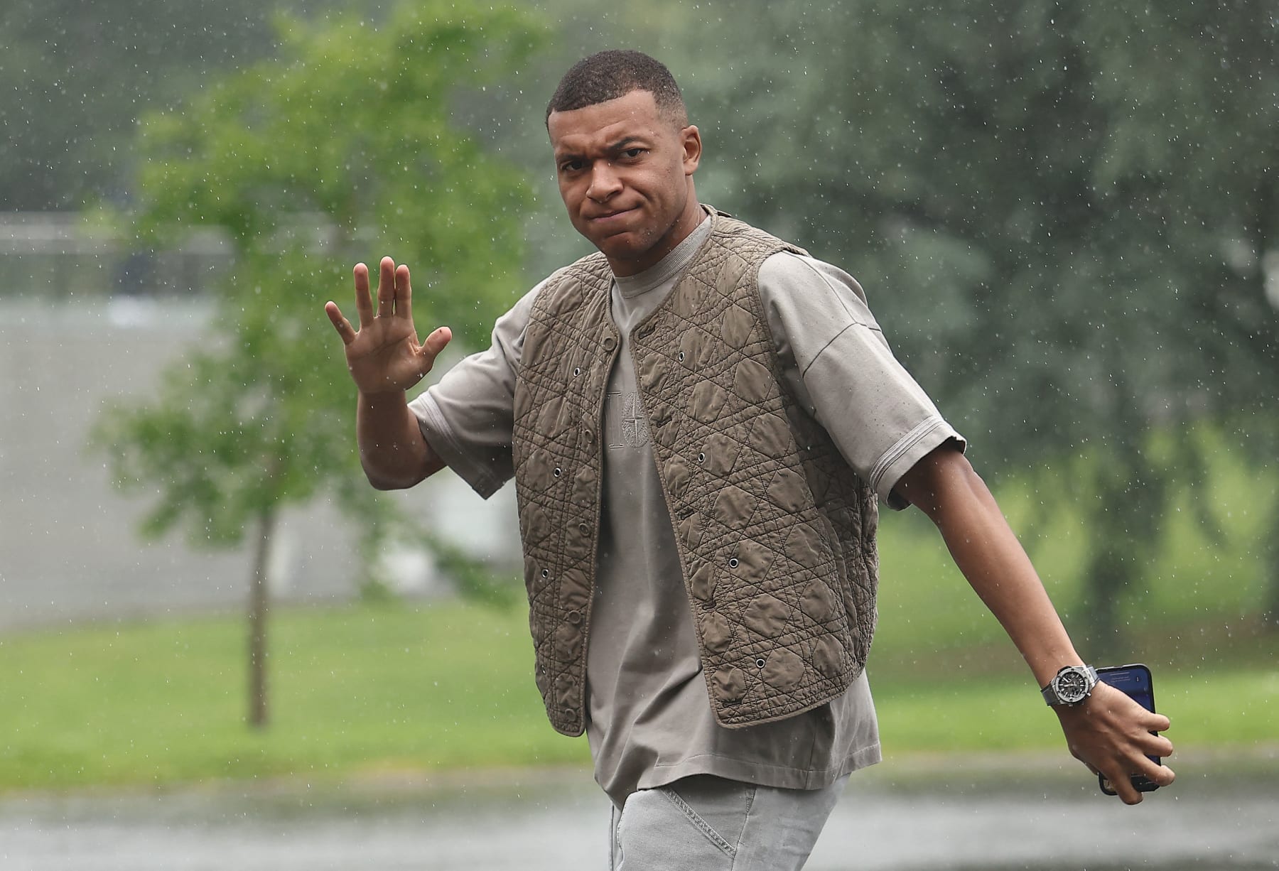 TOPSHOT - France's forward Kylian Mbappe arrives to the national team's training camp for the upcoming UEFA Euro 2024 European Football Championship, in Clairefontaine-en-Yvelines on May 29, 2024. (Photo by FRANCK FIFE / AFP) (Photo by FRANCK FIFE/AFP via Getty Images)