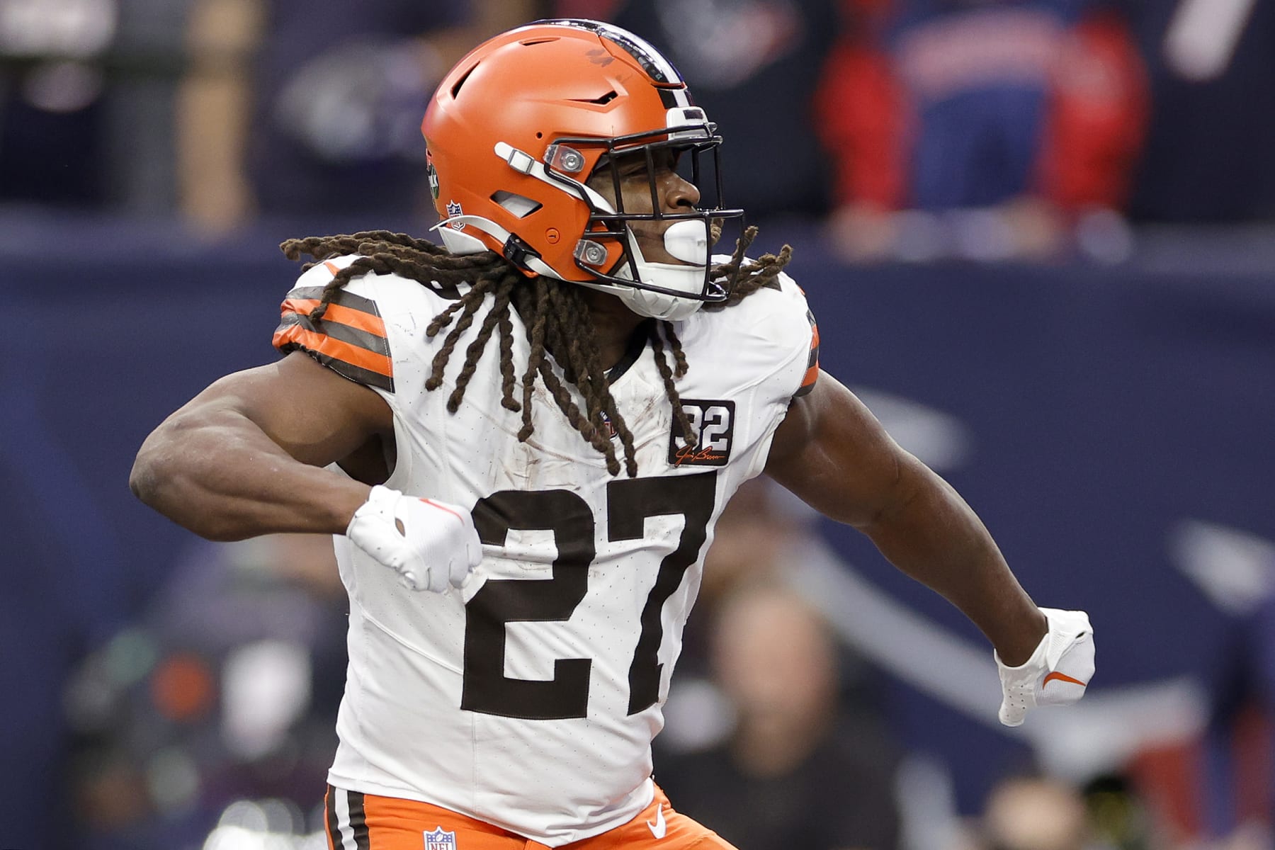 HOUSTON, TEXAS - JANUARY 13: Kareem Hunt #27 of the Cleveland Browns celebrates after scoring a touchdown against the Houston Texans during the first quarter in the AFC Wild Card Playoffs at NRG Stadium on January 13, 2024 in Houston, Texas. (Photo by Carmen Mandato/Getty Images)
