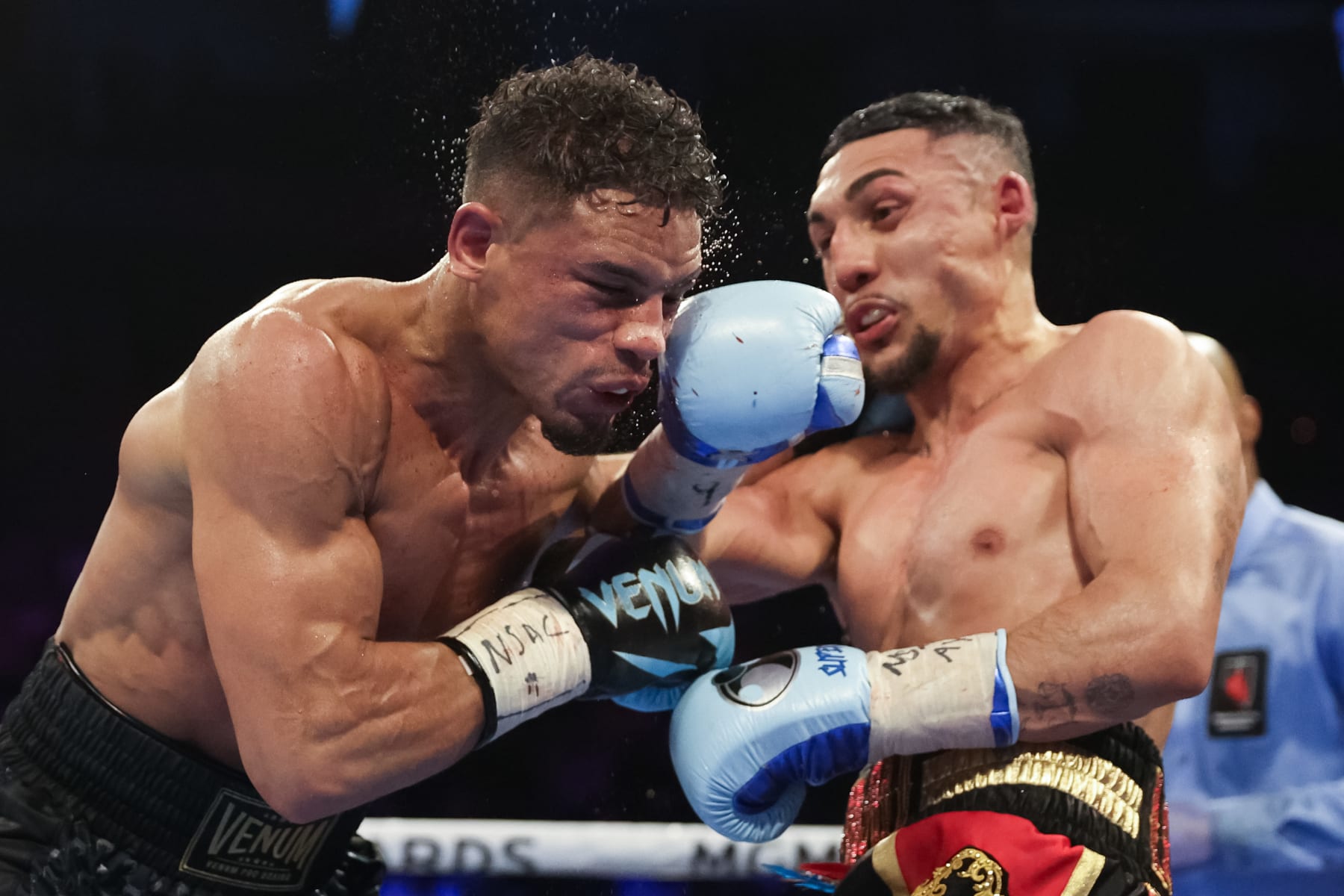 LAS VEGAS, NEVADA - FEBRUARY 08: Teofimo Lopez exchanges punches with Jamaine Ortiz for the WBO junior welterweight title at Michelob ULTRA Arena on February 08, 2024 in Las Vegas, Nevada. (Photo by Jamie Squire/Getty Images)