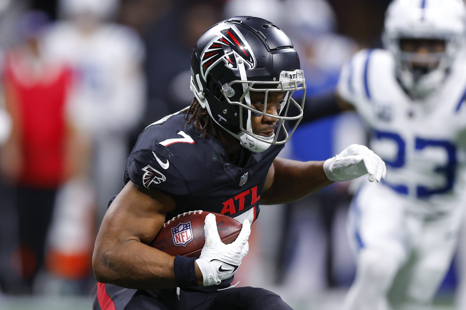 ATLANTA, GEORGIA - DECEMBER 24: Bijan Robinson #7 of the Atlanta Falcons rushes during the first quarter against the Indianapolis Colts at Mercedes-Benz Stadium on December 24, 2023 in Atlanta, Georgia. (Photo by Todd Kirkland/Getty Images)