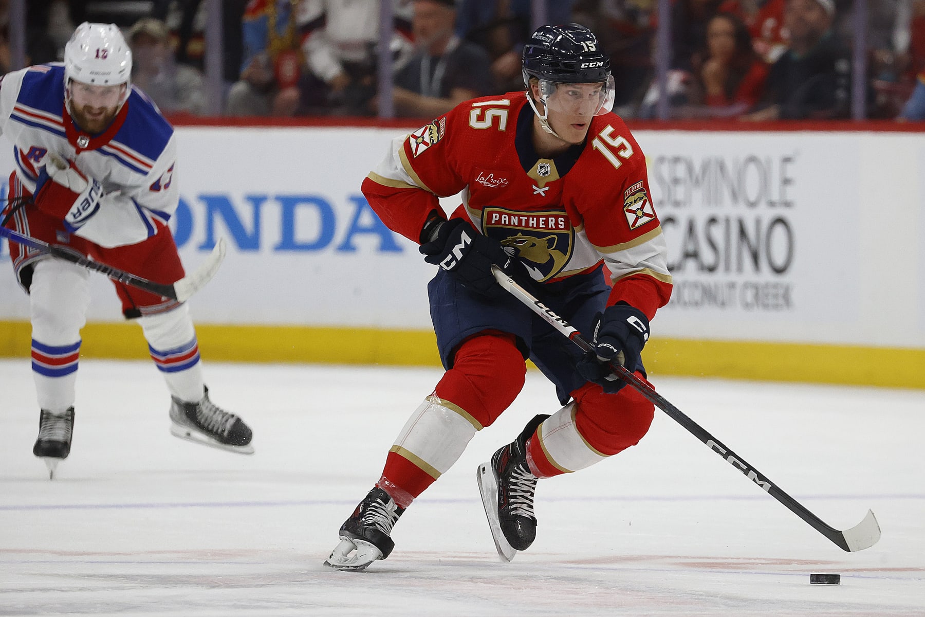 SUNRISE, FLORIDA - JUNE 1: Anton Lundell #15 of the Florida Panthers skates with the puck against the New York Rangers in Game Six of the Eastern Conference Final at the Amerant Bank Arena on June 1, 2024 in Sunrise, Florida. (Photo by Eliot J. Schechter/NHLI via Getty Images)