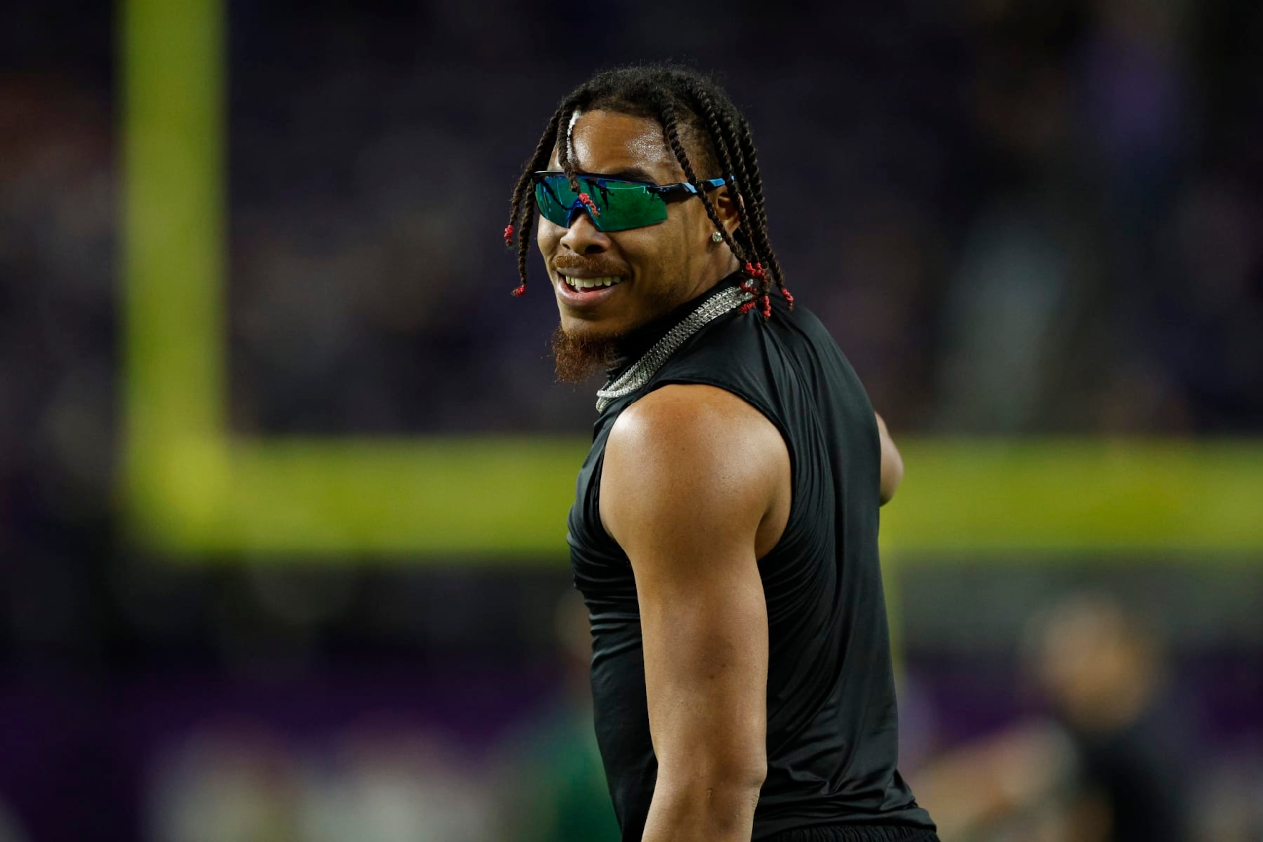 MINNEAPOLIS, MINNESOTA - DECEMBER 31: Justin Jefferson #18 of the Minnesota Vikings warms up prior to a game against the Green Bay Packers at U.S. Bank Stadium on December 31, 2023 in Minneapolis, Minnesota. (Photo by David Berding/Getty Images)