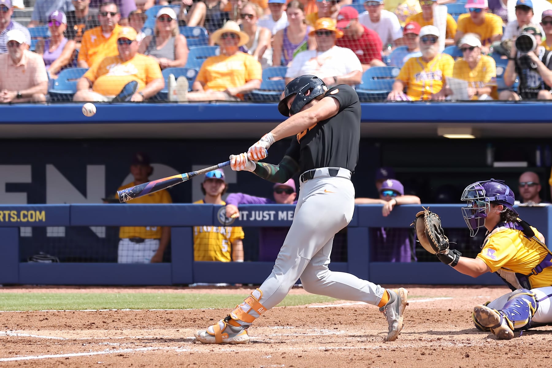 HOOVER, AL - MAY 26: Tennessee Volunteers infielder Billy Amick (11)hits a three run homerun during the 2024 SEC Baseball Tournament championship game between the Tennessee Volunteers and the LSU Tigers on May 26, 2024 at the Hoover Metropolitan Stadium in Hoover, Alabama. (Photo by Michael Wade/Icon Sportswire via Getty Images)