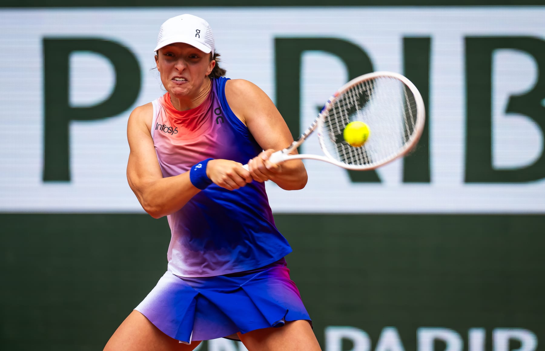 PARIS, FRANCE - JUNE 04: Iga Swiatek of Poland in action against Marketa Vondrousova of the Czech Republic in the quarter-final on Day 10 of the French Open at Roland Garros on June 04, 2024 in Paris, France (Photo by Robert Prange/Getty Images)