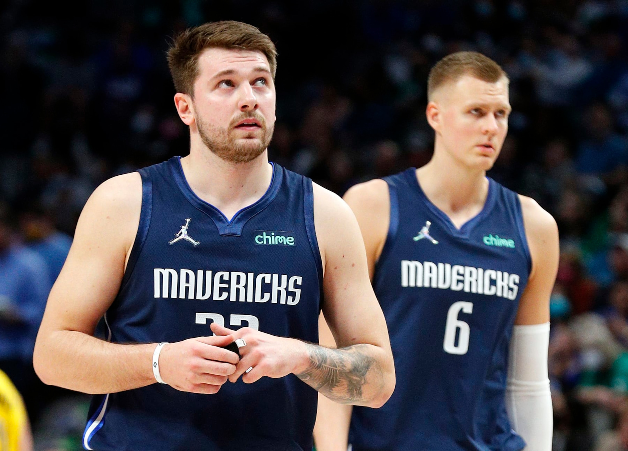 DALLAS, TEXAS - JANUARY 29: Luka Doncic #77 and Kristaps Porzingis #6 of the Dallas Mavericks are seen on the court against the Indiana Pacers at American Airlines Center on January 29, 2022 in Dallas, Texas. NOTE TO USER: User expressly acknowledges and agrees that,  by downloading and or using this photograph,  User is consenting to the terms and conditions of the Getty Images License Agreement. (Photo by Richard Rodriguez/Getty Images)