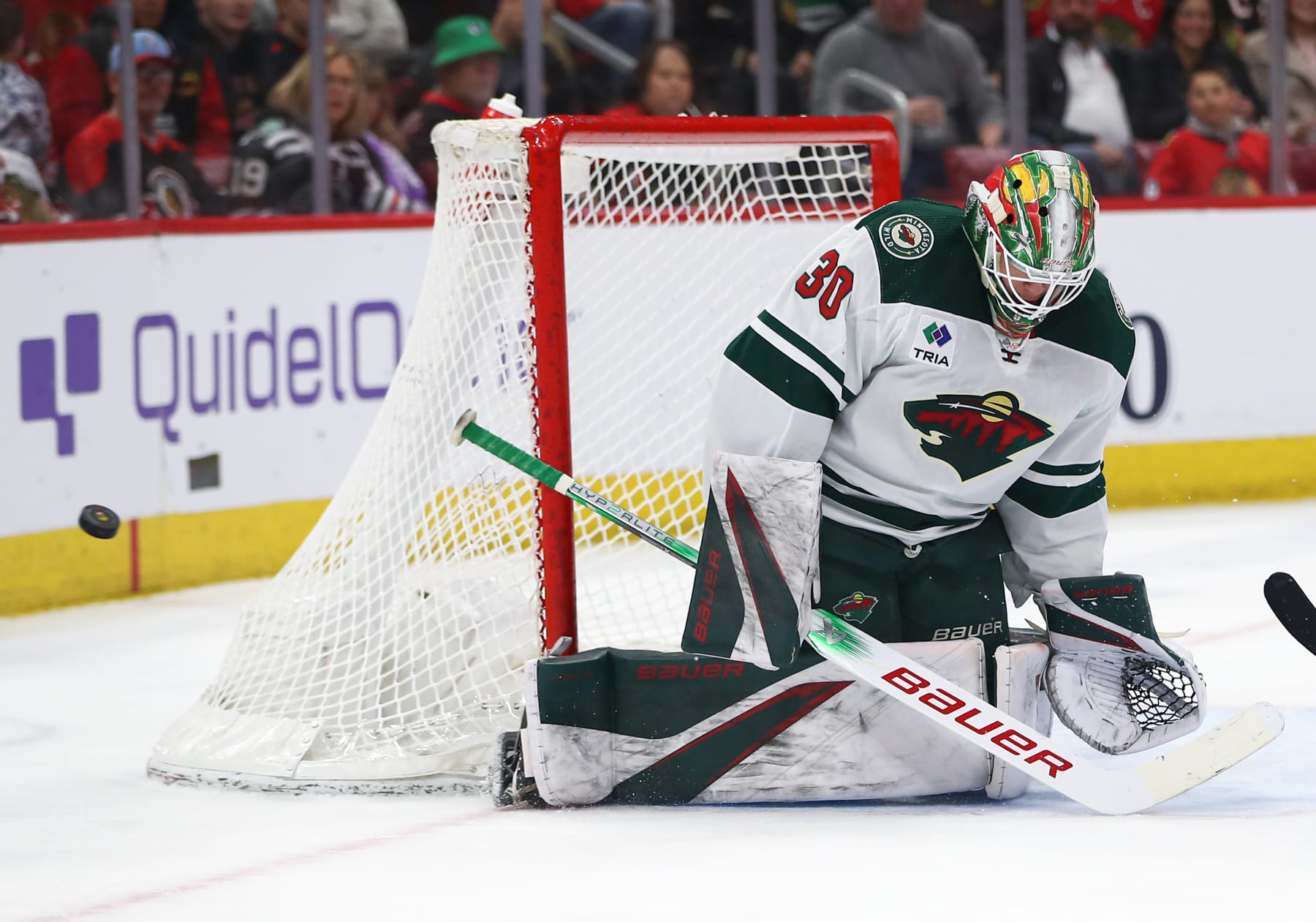 CHICAGO, IL - APRIL 07: Jesper Wallstedt #30 of the Minnesota Wild tends net during the first period against the Chicago Blackhawks at the United Center on April, 7, 2024 in Chicago, Illinois. (Photo by Melissa Tamez/Icon Sportswire via Getty Images)
