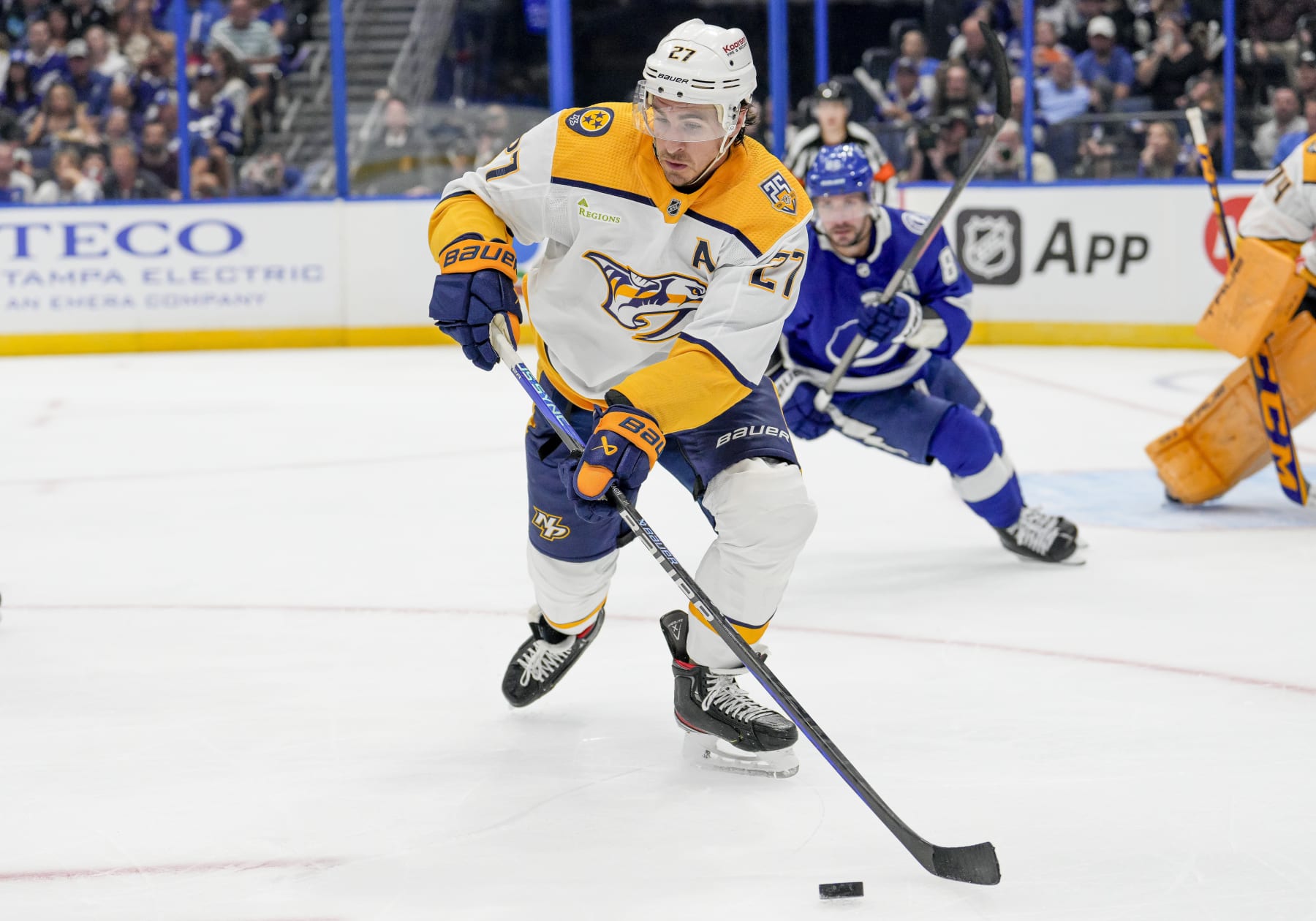 TAMPA, FL - OCTOBER 10: Nashville Predators defenseman Ryan McDonagh (27) clears the puck during the NHL Hockey match between the Tampa Bay Lightning andNashville Predators on October 10th, 2023 at Amalie Arena in Tampa, FL. (Photo by Andrew Bershaw/Icon Sportswire via Getty Images)