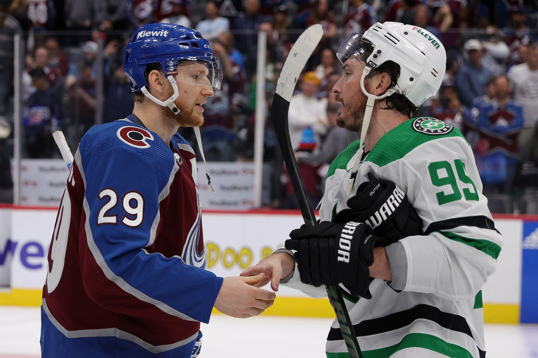 DENVER, COLORADO - MAY 17: Nathan MacKinnon #29 of the Colorado Avalanche shakes hands with Matt Duchene #95 of the Dallas Stars after Game Six of the Second Round of the 2024 Stanley Cup Playoffs at Ball Arena on May 17, 2024 in Denver, Colorado. (Photo by Michael Martin/NHLI via Getty Images)