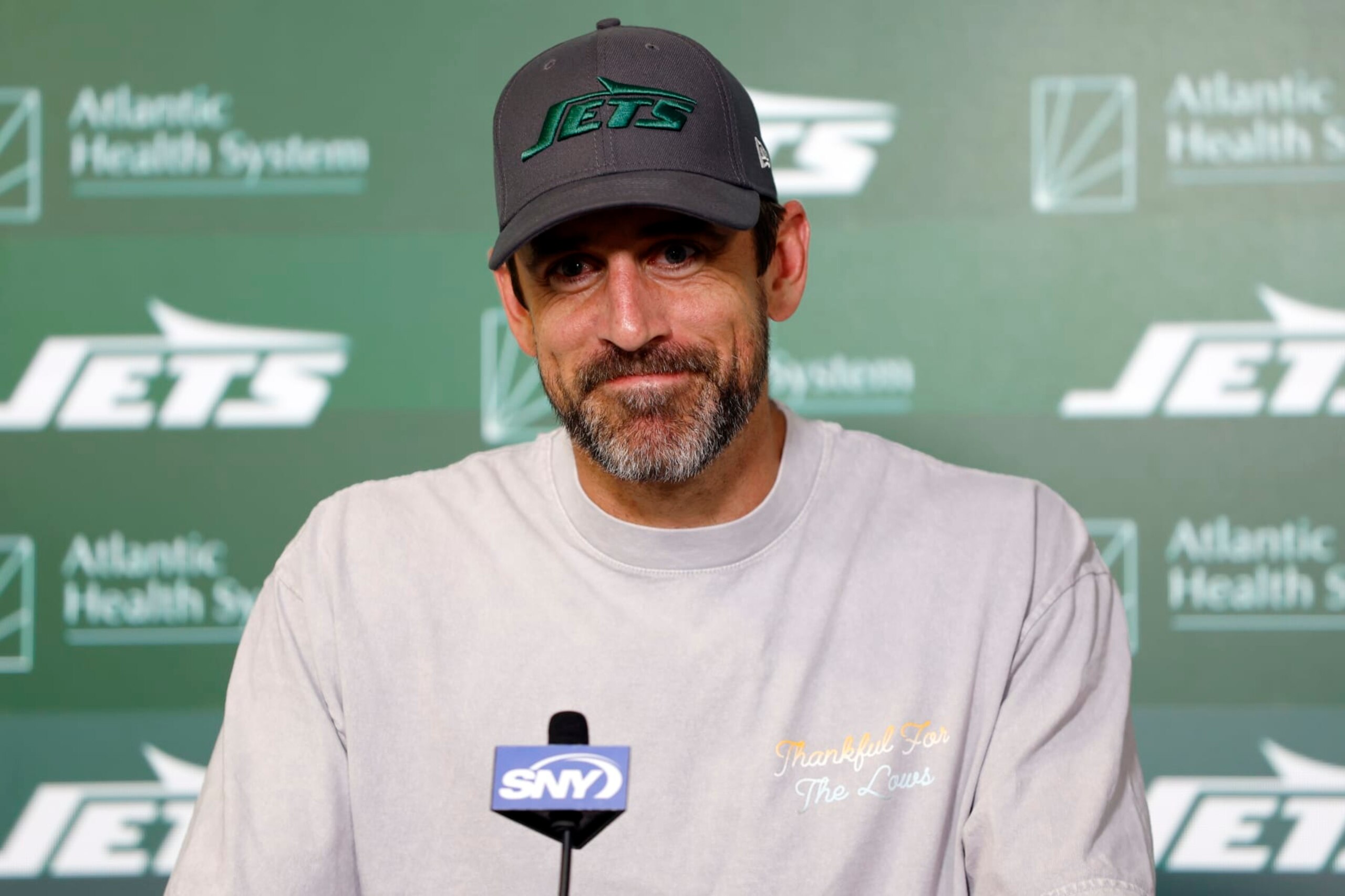 FLORHAM PARK, NEW JERSEY - MAY 21: Aaron Rodgers #8 of the New York Jets speaks to the media during the New York Jets OTA Offseason Workout at Atlantic Health Jets Training Center on May 21, 2024 in Florham Park, New Jersey. (Photo by Sarah Stier/Getty Images) FLORHAM PARK, NEW JERSEY - MAY 21: Aaron Rodgers #8 of the New York Jets speaks to the media during the New York Jets OTA Offseason Workout at Atlantic Health Jets Training Center on May 21, 2024 in Florham Park, New Jersey. (Photo by Sarah Stier/Getty Images)
