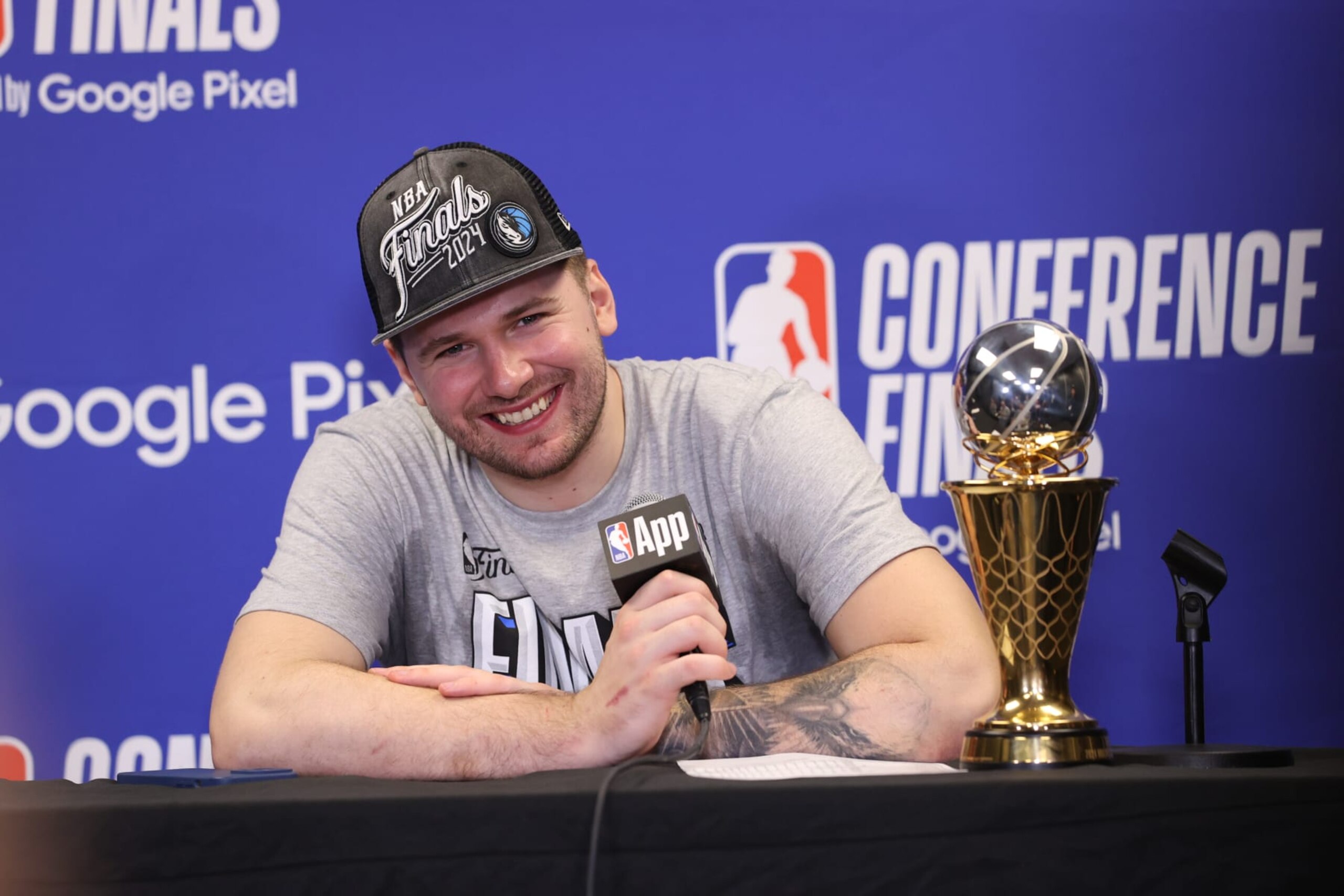 MINNEAPOLIS, MN - MAY 30: Luka Doncic #77 of the Dallas Mavericks speaks during a press conference after winning the Earvin "Magic" Johnson Trophy for the NBA Western Conference Finals Most Valuable Player during Round 3 Game 5 of the 2024 NBA Playoffs on May 30, 2024 at Target Center in Minneapolis, Minnesota. NOTE TO USER: User expressly acknowledges and agrees that, by downloading and or using this Photograph, user is consenting to the terms and conditions of the Getty Images License Agreement. Mandatory Copyright Notice: Copyright 2024 NBAE (Photo by Joe Murphy/NBAE via Getty Images)