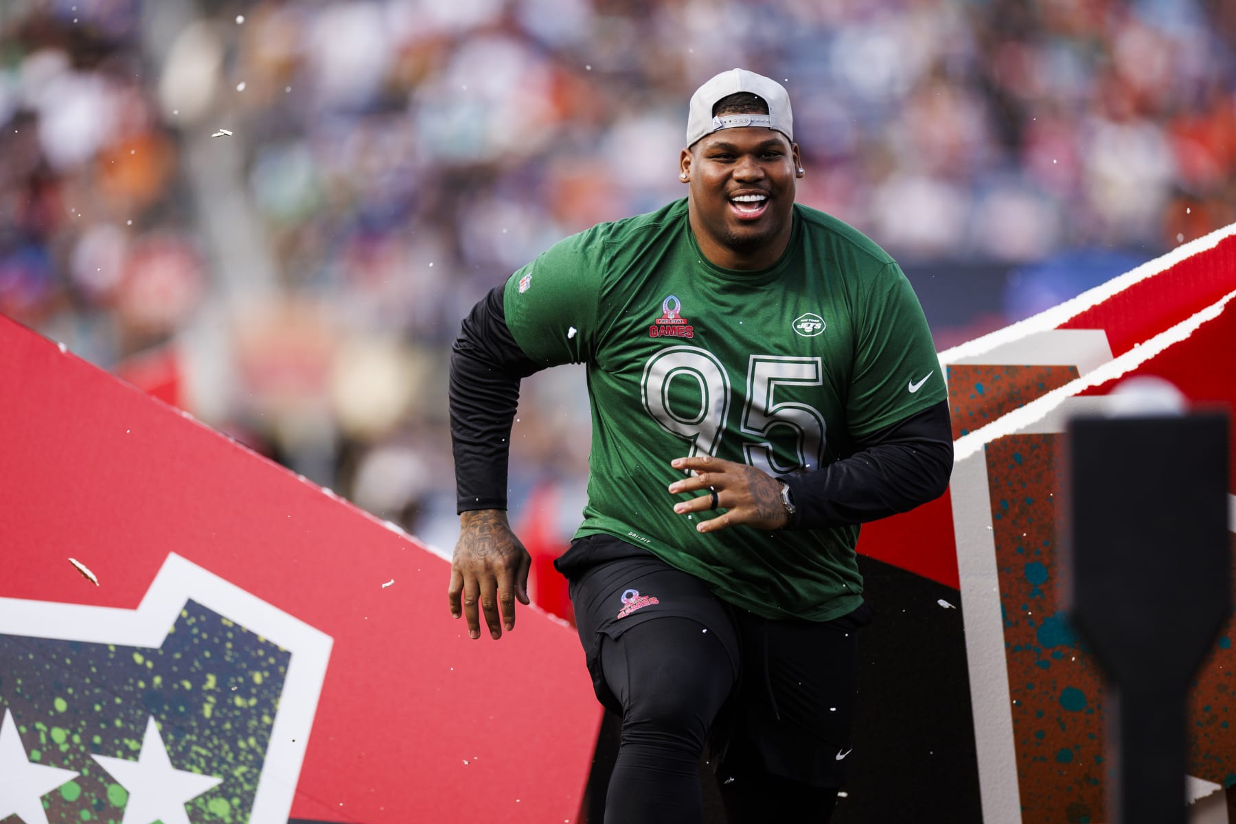 ORLANDO, FLORIDA - FEBRUARY 04: Quinnen Williams #95 of the New York Jets and AFC looks on during the 2024 NFL Pro Bowl at Camping World Stadium on February 04, 2024 in Orlando, Florida. (Photo by James Gilbert/Getty Images)