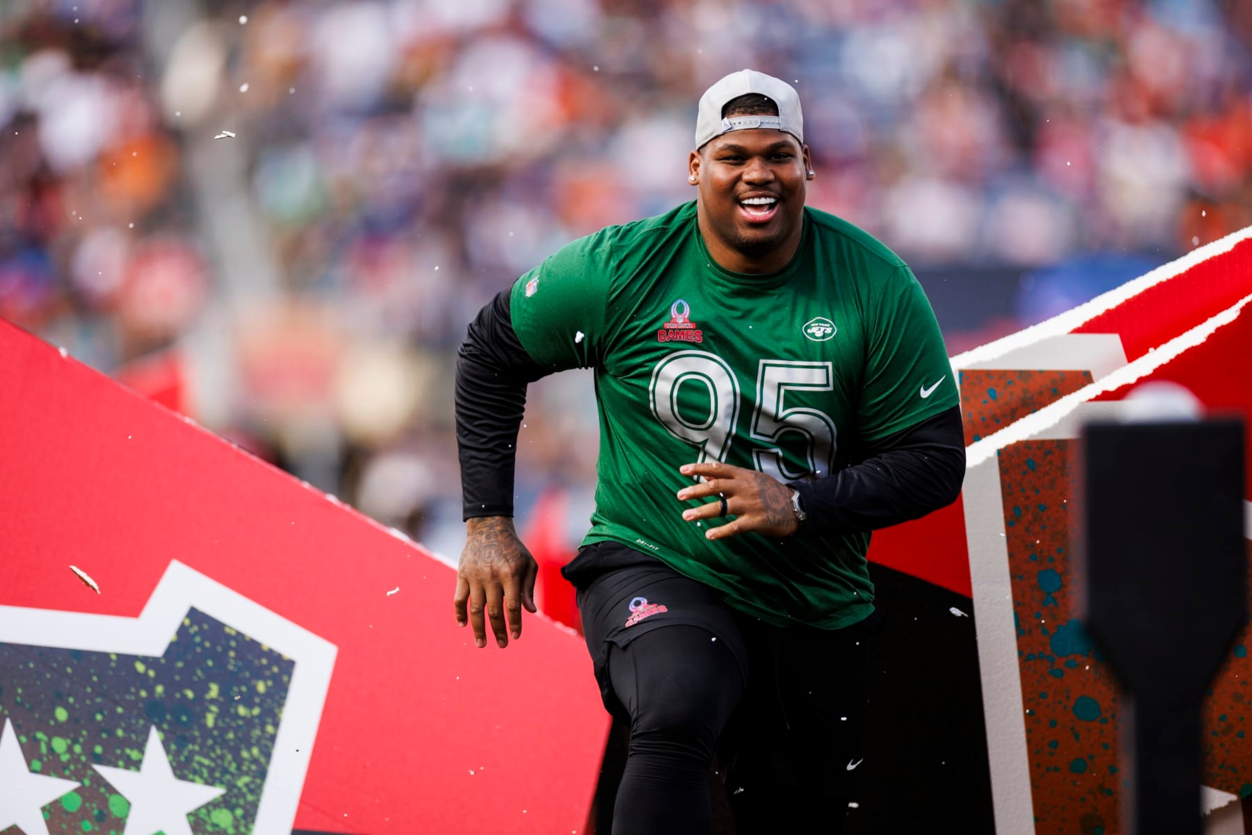 ORLANDO, FLORIDA - FEBRUARY 04: Quinnen Williams #95 of the New York Jets and AFC looks on during the 2024 NFL Pro Bowl at Camping World Stadium on February 04, 2024 in Orlando, Florida. (Photo by James Gilbert/Getty Images)