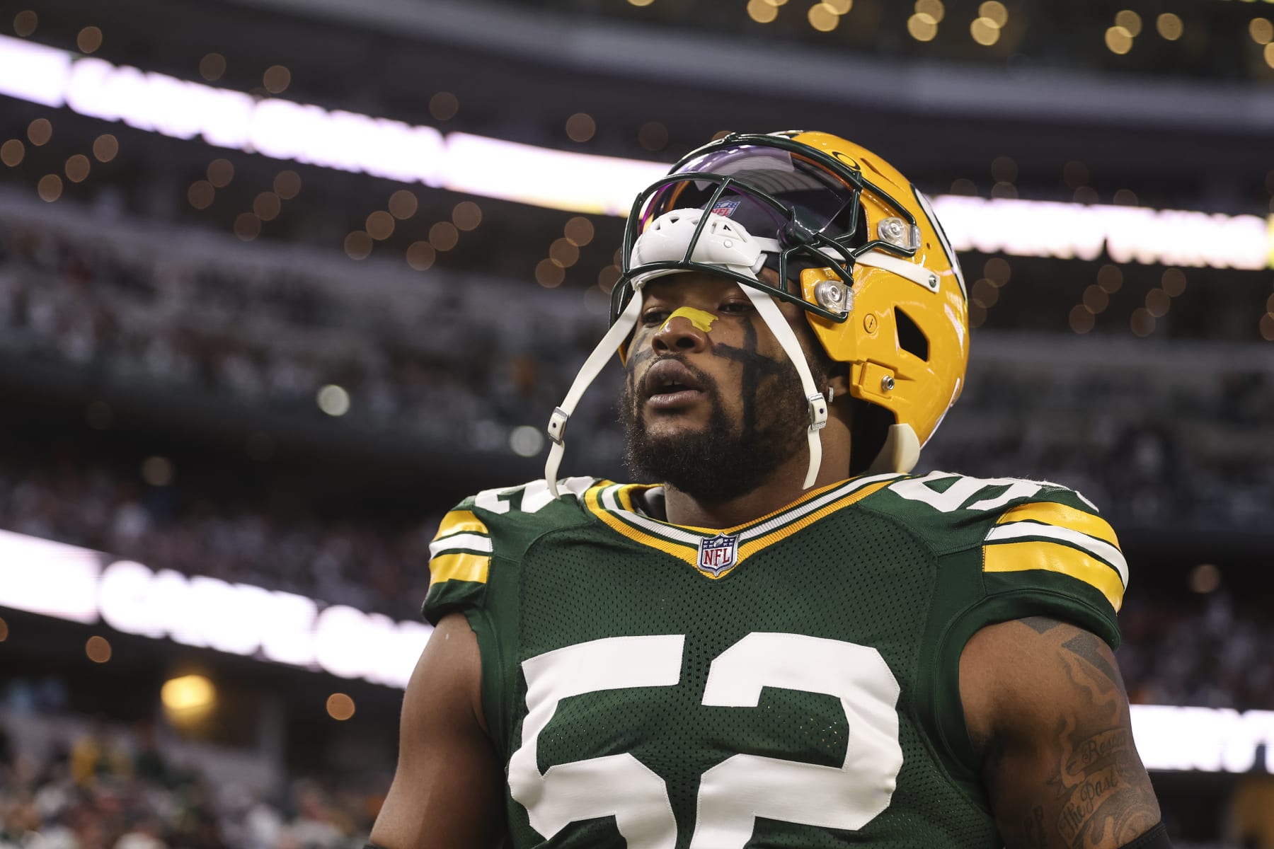 ARLINGTON, TX - JANUARY 14: Rashan Gary #52 of the Green Bay Packers warms up prior to an NFL wild-card playoff football game against the Dallas Cowboys at AT&T Stadium on January 14, 2024 in Arlington, Texas. (Photo by Perry Knotts/Getty Images)