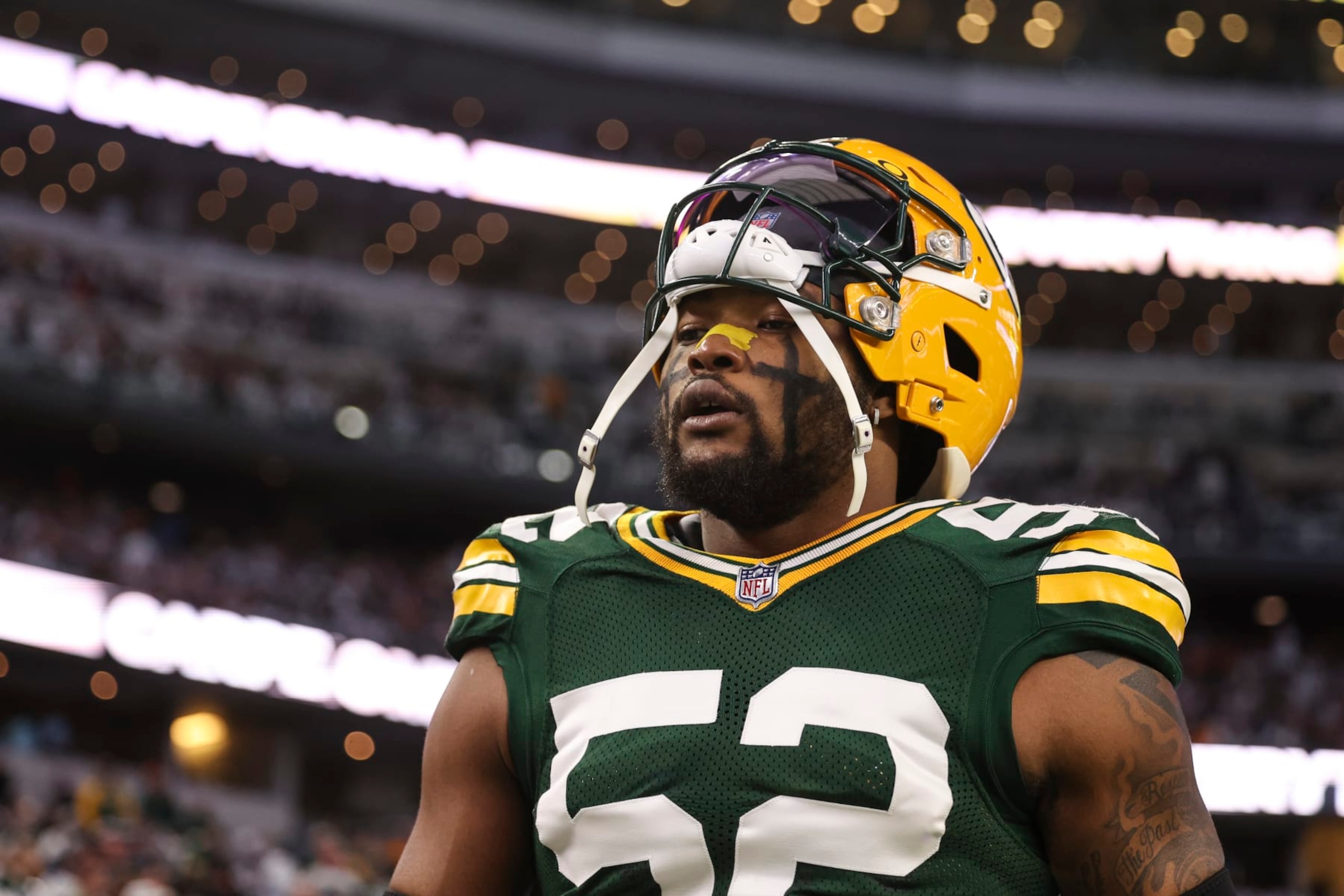 ARLINGTON, TX - JANUARY 14: Rashan Gary #52 of the Green Bay Packers warms up prior to an NFL wild-card playoff football game against the Dallas Cowboys at AT&T Stadium on January 14, 2024 in Arlington, Texas. (Photo by Perry Knotts/Getty Images)