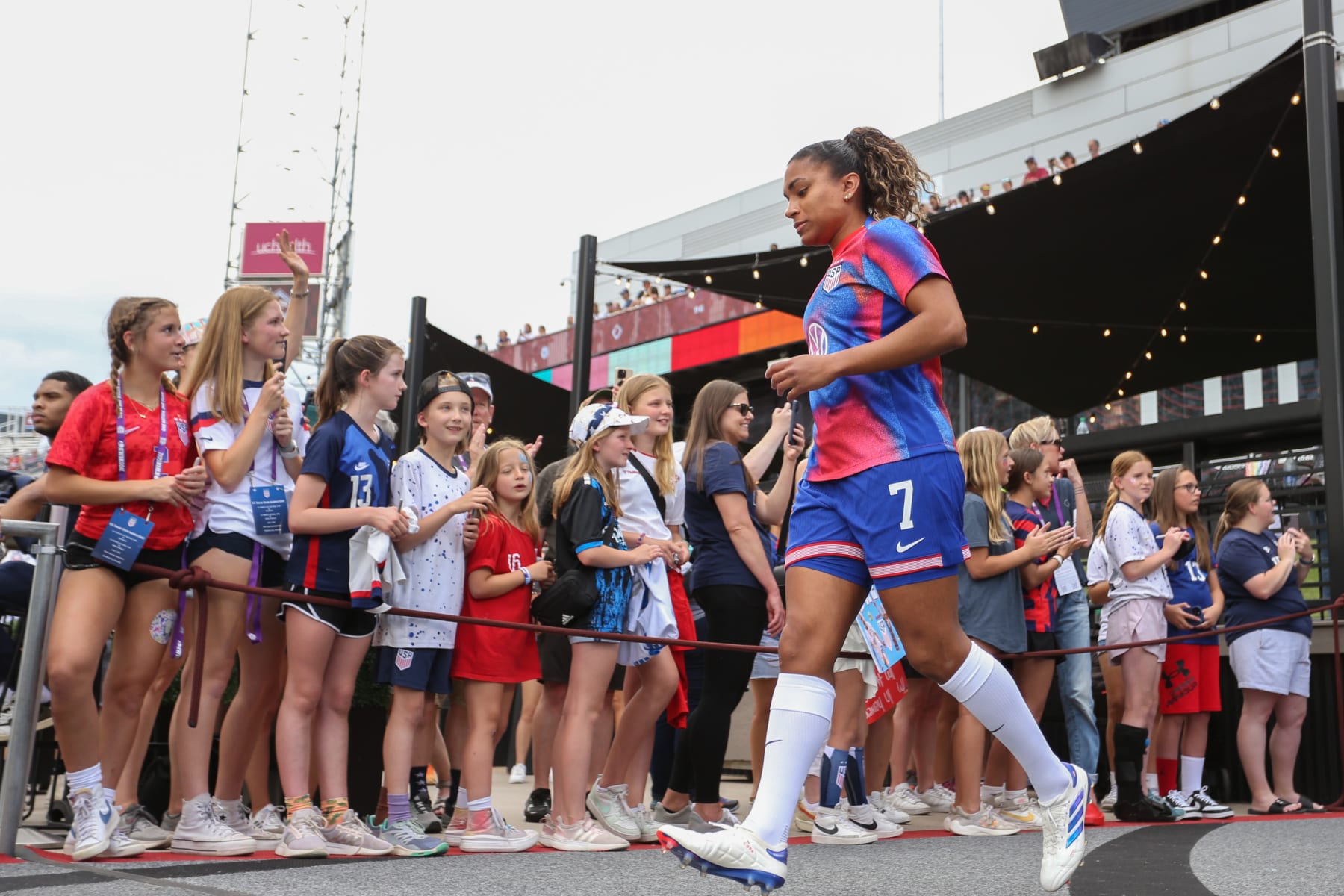 COMMERCE CITY, COLORADO - JUNE 01: Catarina Macario #7 of the United States enter the field for warmups prior to playing the Korea Republic at Dick's Sporting Goods Park on June 01, 2024 in Commerce City, Colorado. (Photo by Erin Chang/ISI Photos/USSF/Getty Images for USSF)