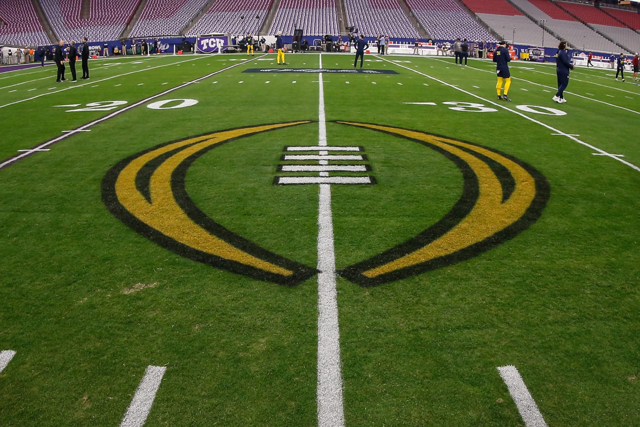 GLENDALE, AZ - DECEMBER 31:  The College Football Playoff logo on the field before the VRBO Fiesta Bowl college football national championship semifinal game between the Michigan Wolverines and the TCU Horned Frogs on December 31, 2022 at State Farm Stadium in Glendale, Arizona. (Photo by Kevin Abele/Icon Sportswire via Getty Images)