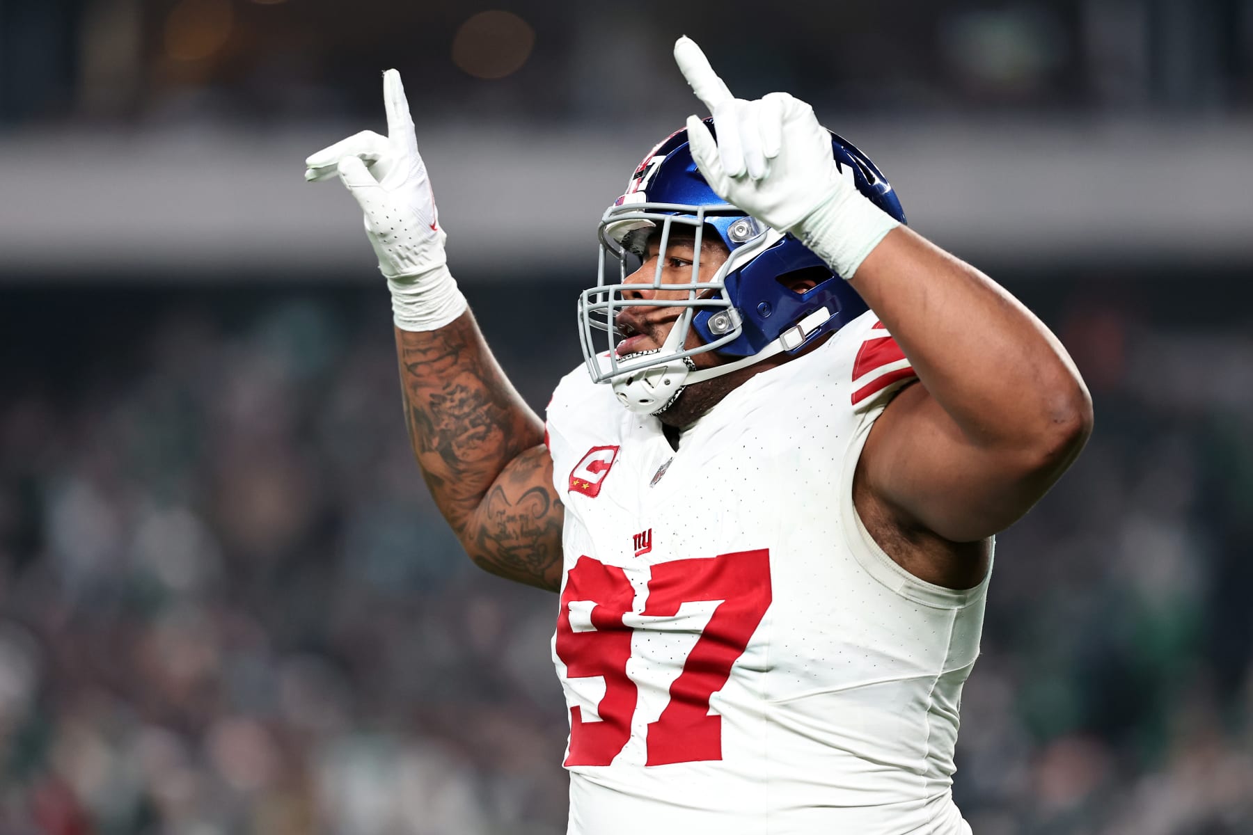 PHILADELPHIA, PENNSYLVANIA - DECEMBER 25: Dexter Lawrence II #97 of the New York Giants celebrates a tackle for loss during the second quarter against the Philadelphia Eagles at Lincoln Financial Field on December 25, 2023 in Philadelphia, Pennsylvania. (Photo by Dustin Satloff/Getty Images)