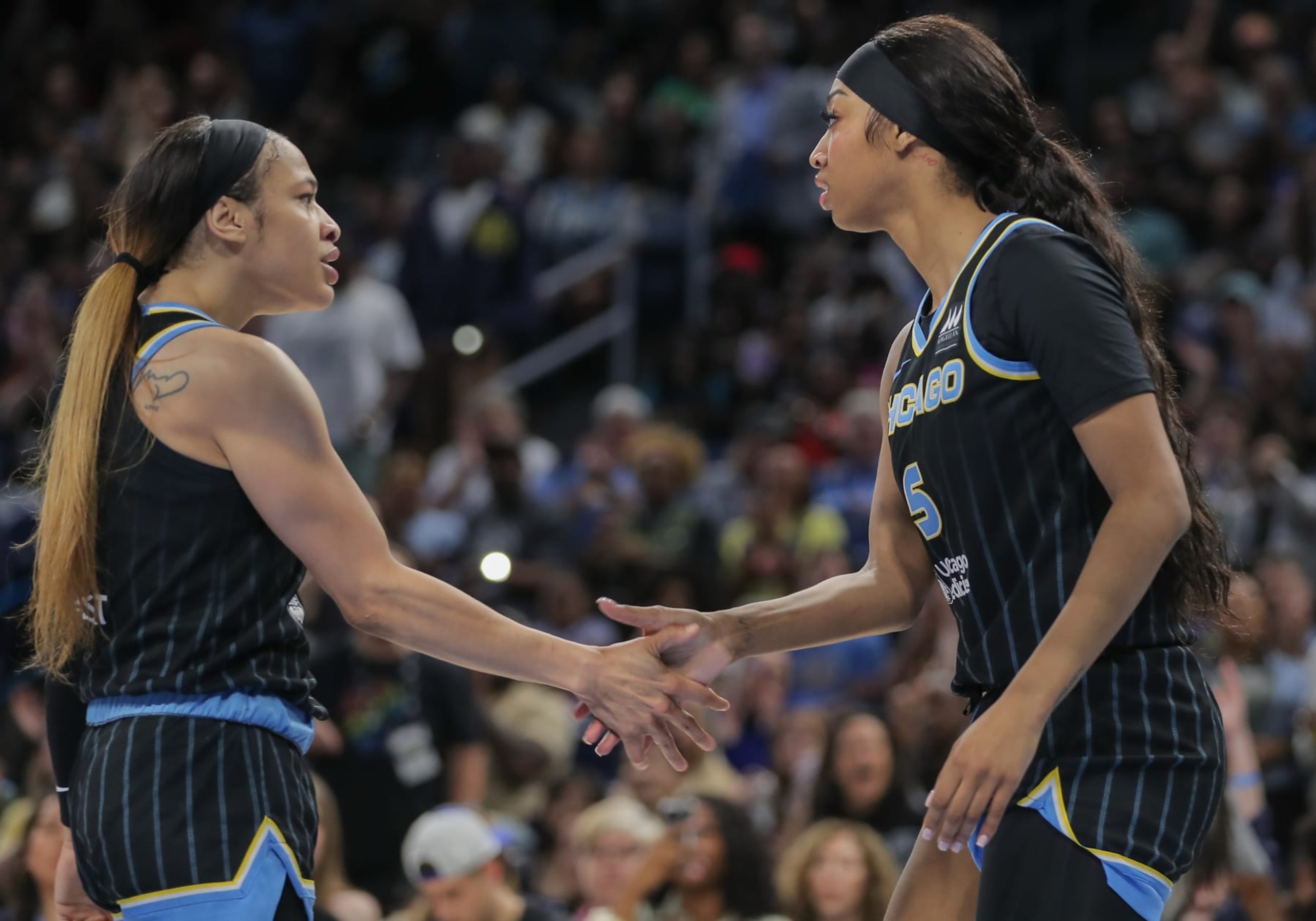 CHICAGO, IL - JUNE 04: Chennedy Carter #7 of the Chicago Sky and Angel Reese #5 of the Chicago Sky during he first half against the New York Liberty on June 4, 2024 at Wintrust Arena in Chicago, Illinois. (Photo by Melissa Tamez/ Icon Sportswire)