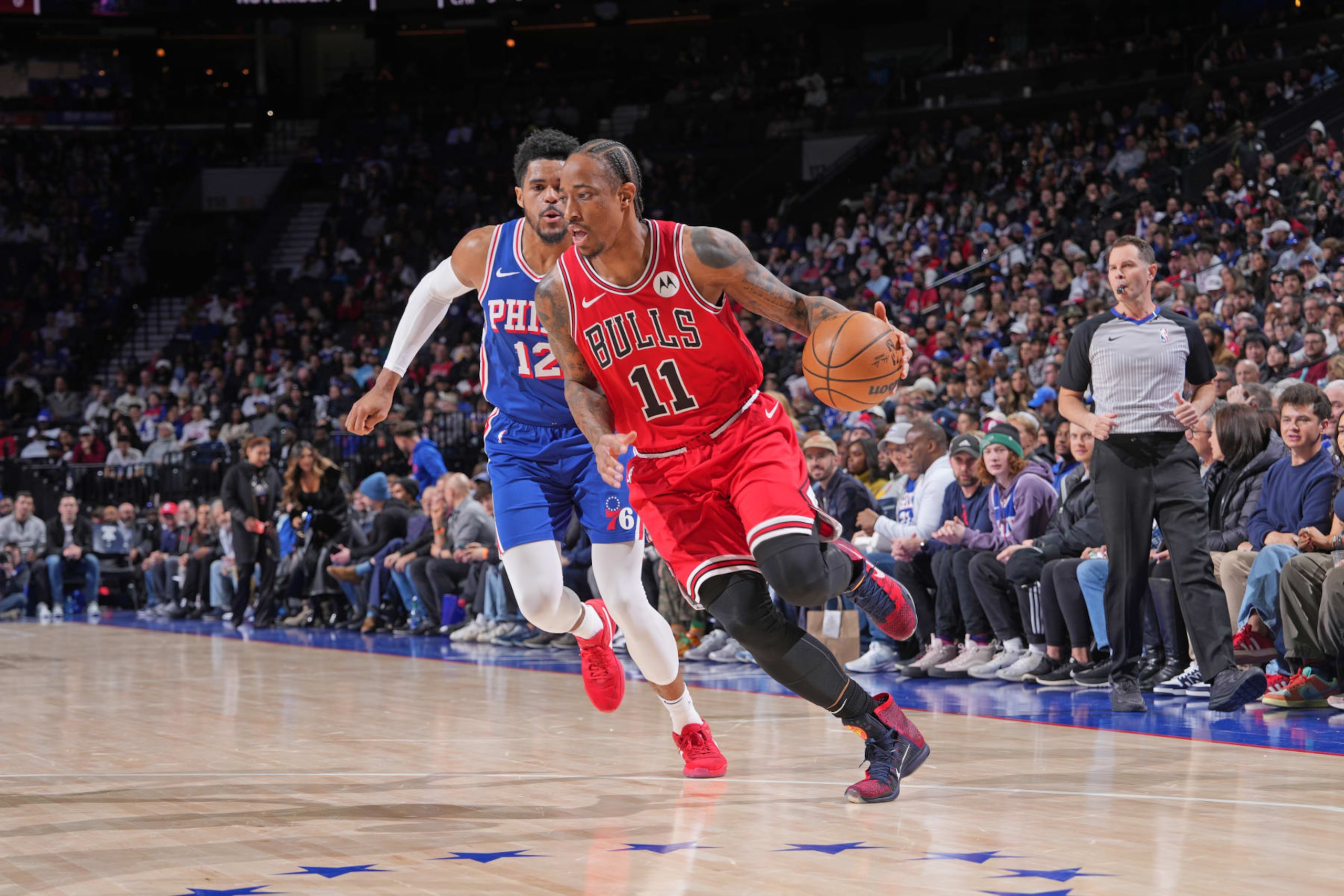 PHILADELPHIA, PA - JANUARY 2: DeMar DeRozan #11 of the Chicago Bulls dribbles the ball during the game against the Philadelphia 76ers on January 2, 2024 at the Wells Fargo Center in Philadelphia, Pennsylvania NOTE TO USER: User expressly acknowledges and agrees that, by downloading and/or using this Photograph, user is consenting to the terms and conditions of the Getty Images License Agreement. Mandatory Copyright Notice: Copyright 2023 NBAE (Photo by Jesse D. Garrabrant/NBAE via Getty Images) PHILADELPHIA, PA - JANUARY 2: DeMar DeRozan #11 of the Chicago Bulls dribbles the ball during the game against the Philadelphia 76ers on January 2, 2024 at the Wells Fargo Center in Philadelphia, Pennsylvania NOTE TO USER: User expressly acknowledges and agrees that, by downloading and/or using this Photograph, user is consenting to the terms and conditions of the Getty Images License Agreement. Mandatory Copyright Notice: Copyright 2023 NBAE (Photo by Jesse D. Garrabrant/NBAE via Getty Images)