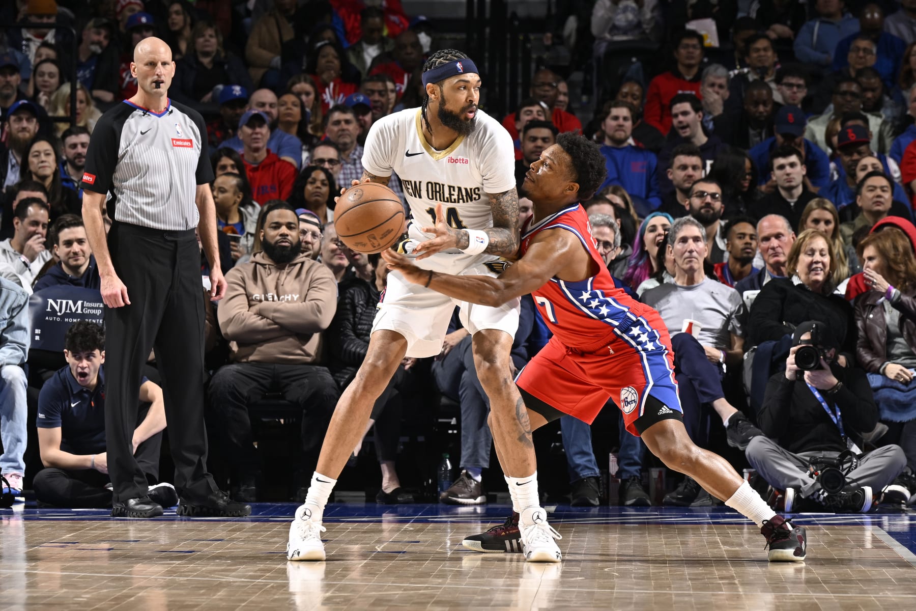 PHILADELPHIA, PA - MARCH 8:   Kyle Lowry #7 of the Philadelphia 76ers plays defense against Brandon Ingram #14 of the New Orleans Pelicans on March 8, 2024 at the Wells Fargo Center in Philadelphia, Pennsylvania NOTE TO USER: User expressly acknowledges and agrees that, by downloading and/or using this Photograph, user is consenting to the terms and conditions of the Getty Images License Agreement. Mandatory Copyright Notice: Copyright 2024 NBAE (Photo by David Dow/NBAE via Getty Images)
