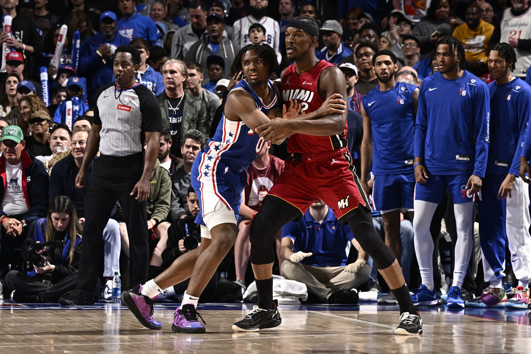 PHILADELPHIA, PA - APRIL 17:  Tyrese Maxey #0 of the Philadelphia 76ers and Jimmy Butler #22 of the Miami Heat battle for position during the 2024 NBA Play-In Tournament on April 17, 2024 at the Wells Fargo Center in Philadelphia, Pennsylvania NOTE TO USER: User expressly acknowledges and agrees that, by downloading and/or using this Photograph, user is consenting to the terms and conditions of the Getty Images License Agreement. Mandatory Copyright Notice: Copyright 2024 NBAE (Photo by David Dow/NBAE via Getty Images)