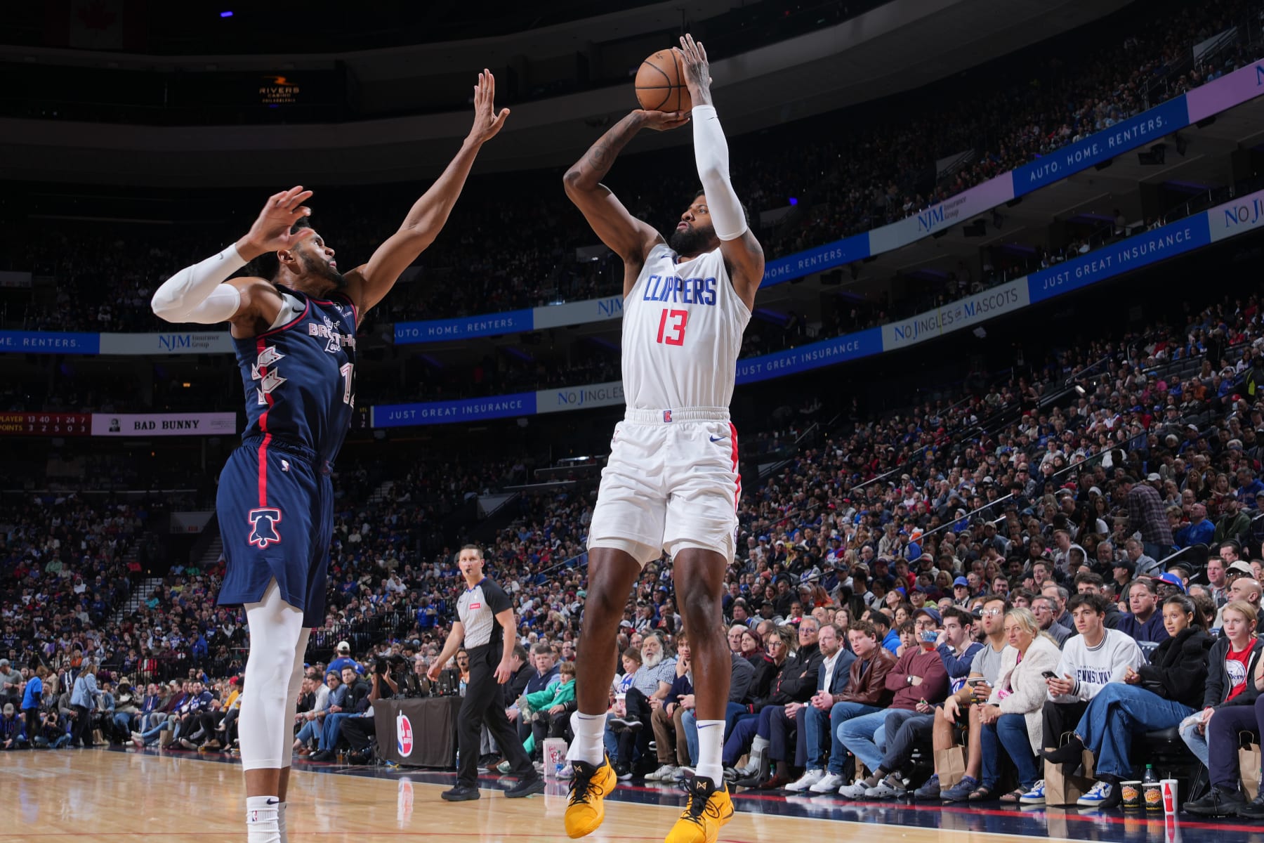 PHILADELPHIA, PA - MARCH 27: Paul George #13 of the LA Clippers shoots the ball during the game against the Philadelphia 76ers on March 27, 2024 at the Wells Fargo Center in Philadelphia, Pennsylvania NOTE TO USER: User expressly acknowledges and agrees that, by downloading and/or using this Photograph, user is consenting to the terms and conditions of the Getty Images License Agreement. Mandatory Copyright Notice: Copyright 2024 NBAE (Photo by Jesse D. Garrabrant/NBAE via Getty Images)