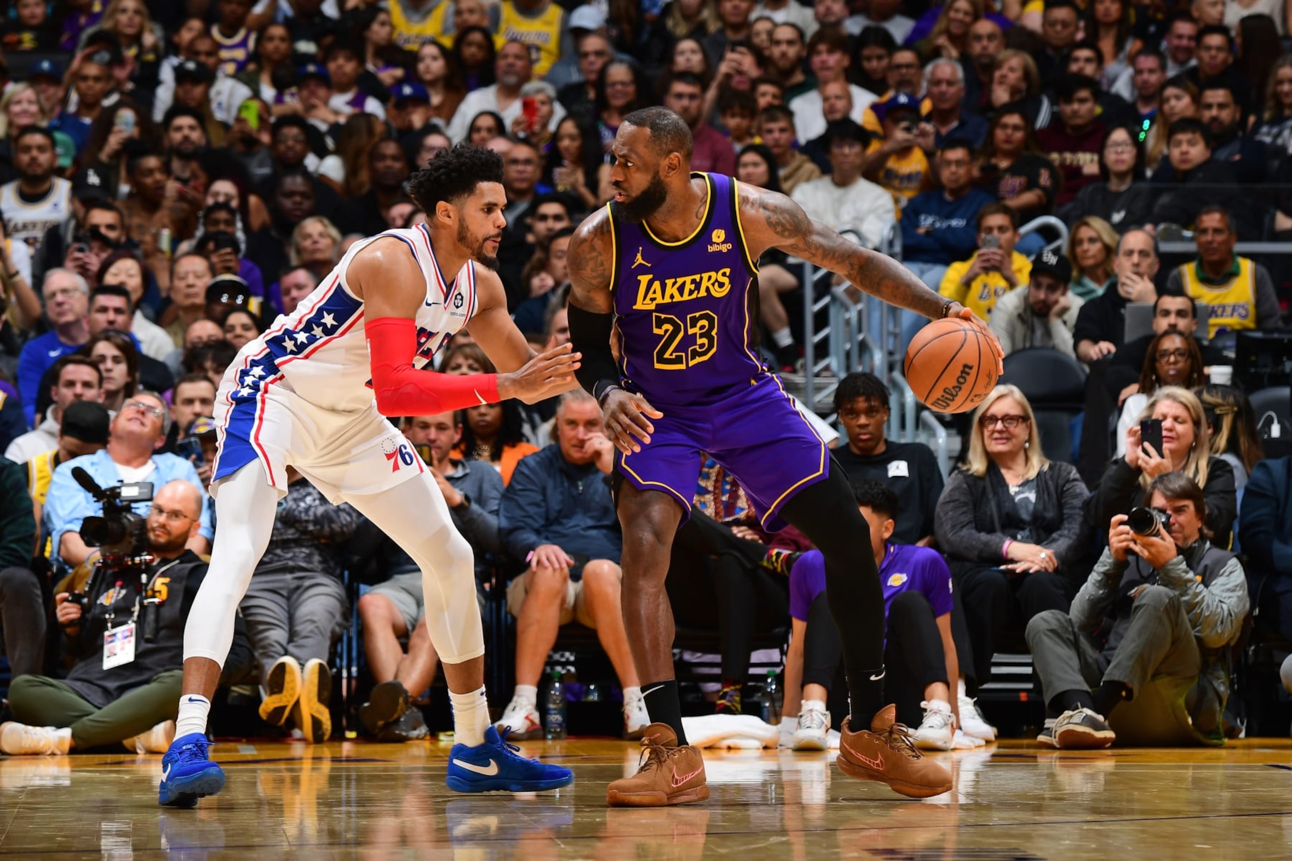 LOS ANGELES, CA - MARCH 22: LeBron James #23 of the Los Angeles Lakers handles the ball during the game against the Philadelphia 76ers on March 22, 2024 at Crypto.Com Arena in Los Angeles, California. NOTE TO USER: User expressly acknowledges and agrees that, by downloading and/or using this Photograph, user is consenting to the terms and conditions of the Getty Images License Agreement. Mandatory Copyright Notice: Copyright 2024 NBAE (Photo by Adam Pantozzi/NBAE via Getty Images) LOS ANGELES, CA - MARCH 22: LeBron James #23 of the Los Angeles Lakers handles the ball during the game against the Philadelphia 76ers on March 22, 2024 at Crypto.Com Arena in Los Angeles, California. NOTE TO USER: User expressly acknowledges and agrees that, by downloading and/or using this Photograph, user is consenting to the terms and conditions of the Getty Images License Agreement. Mandatory Copyright Notice: Copyright 2024 NBAE (Photo by Adam Pantozzi/NBAE via Getty Images)