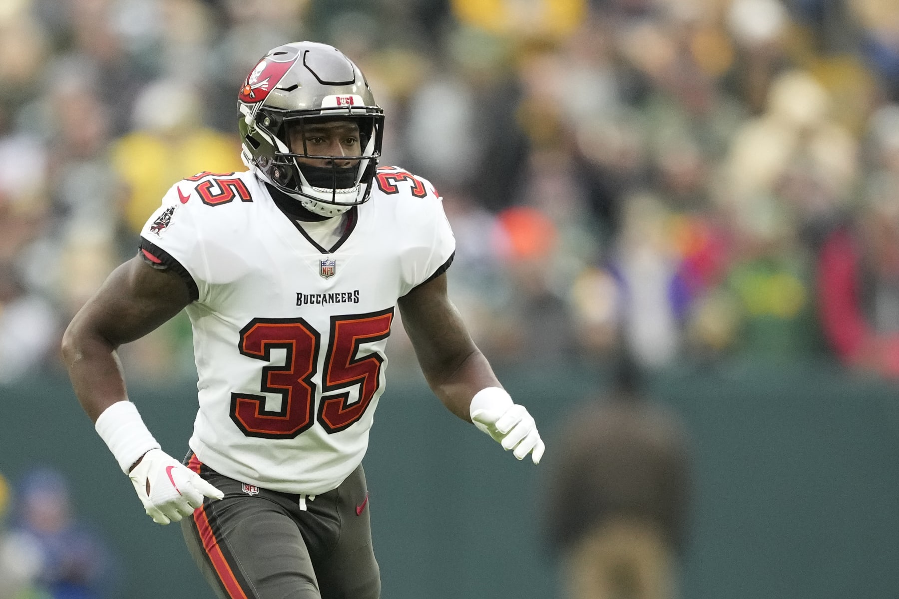 GREEN BAY, WISCONSIN - DECEMBER 17: Jamel Dean #35 of the Tampa Bay Buccaneers in action during the second half against the Green Bay Packers at Lambeau Field on December 17, 2023 in Green Bay, Wisconsin. (Photo by Patrick McDermott/Getty Images)