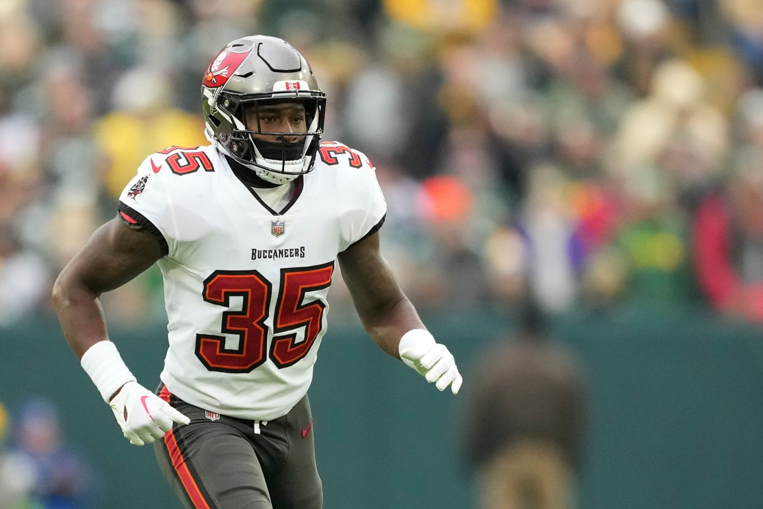 GREEN BAY, WISCONSIN - DECEMBER 17: Jamel Dean #35 of the Tampa Bay Buccaneers in action during the second half against the Green Bay Packers at Lambeau Field on December 17, 2023 in Green Bay, Wisconsin. (Photo by Patrick McDermott/Getty Images)