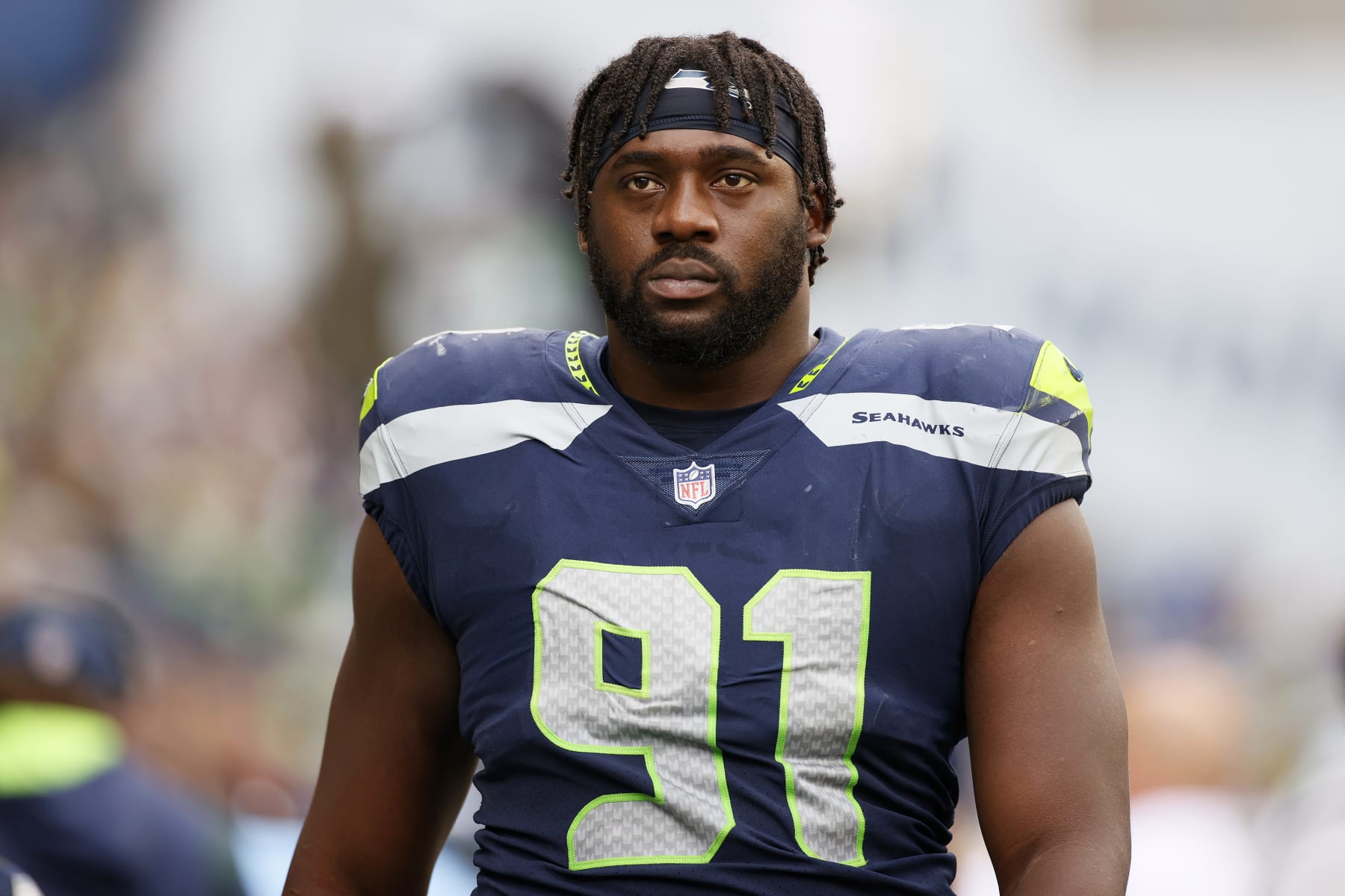 SEATTLE, WASHINGTON - SEPTEMBER 19: L.J. Collier #91 of the Seattle Seahawks looks on during the fourth quarter against the Tennessee Titans at Lumen Field on September 19, 2021 in Seattle, Washington. (Photo by Steph Chambers/Getty Images)