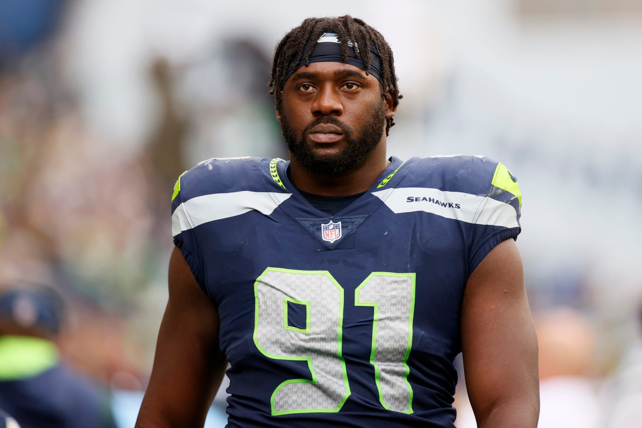 SEATTLE, WASHINGTON - SEPTEMBER 19: L.J. Collier #91 of the Seattle Seahawks looks on during the fourth quarter against the Tennessee Titans at Lumen Field on September 19, 2021 in Seattle, Washington. (Photo by Steph Chambers/Getty Images)