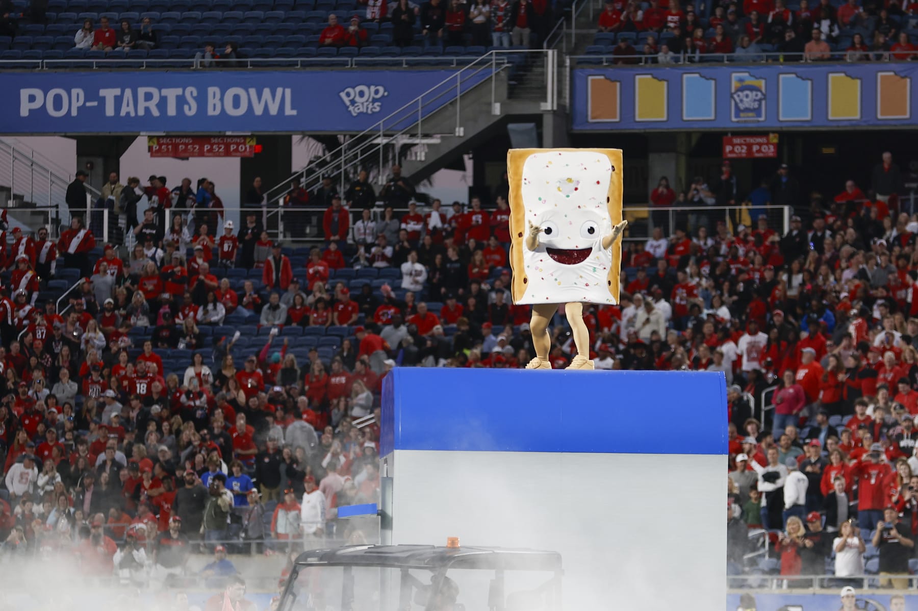 ORLANDO, FL - DECEMBER 28: The Pop-Tart Bowl mascot, Strawberry, after the game between the North Carolina State Wolfpack and the Kansas State Wildcats on December 28, 2023 at Camping World Stadium in Orlando, Fl. (Photo by David Rosenblum/Icon Sportswire via Getty Images)