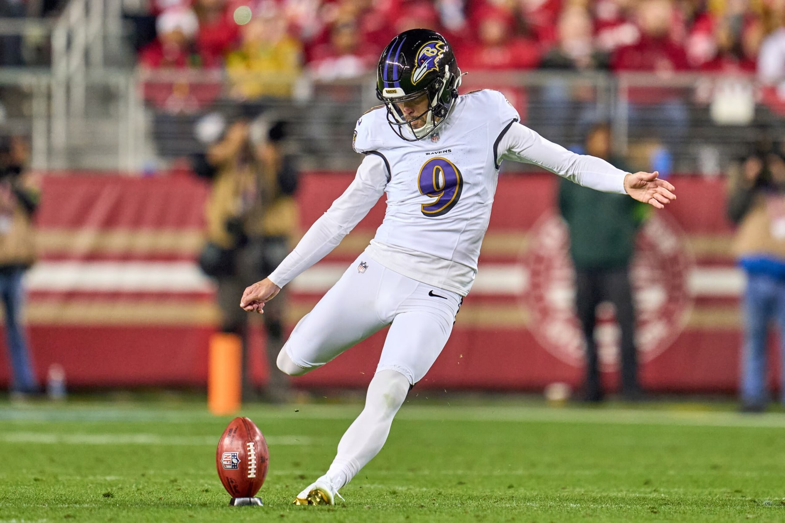 SANTA CLARA, CALIFORNIA - DECEMBER 25: Justin Tucker #9 of the Baltimore Ravens kicks the football in action during a game between the San Francisco 49ers and the Baltimore Ravens at Levi's Stadium on December 25, 2023 in Santa Clara, California. (Photo by Robin Alam/ISI Photos/Getty Images)