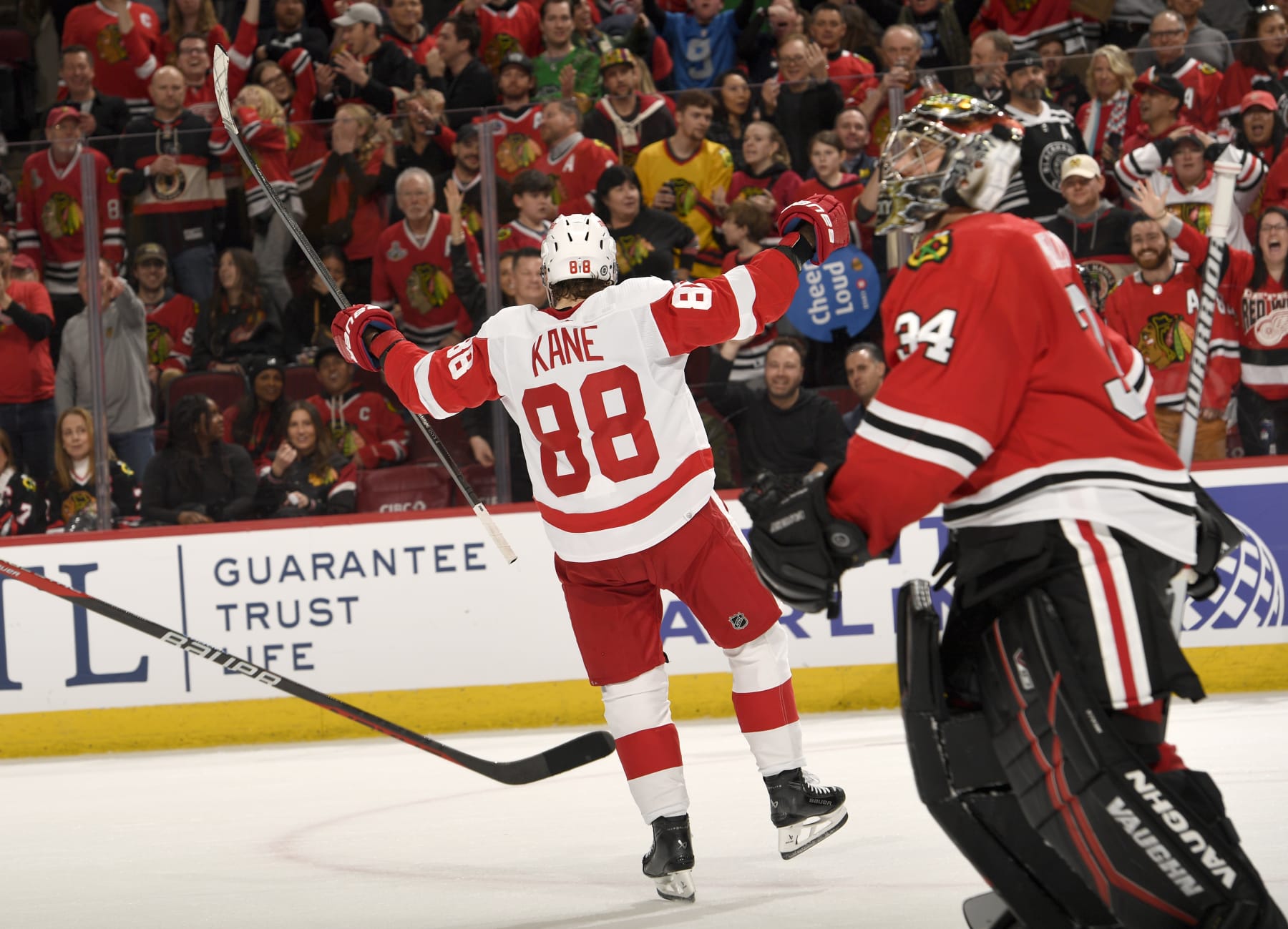 CHICAGO, ILLINOIS - FEBRUARY 25: Patrick Kane #88 of the Detroit Red Wings reacts after scoring in overtime against the Chicago Blackhawks at the United Center on February 25, 2024 in Chicago, Illinois. (Photo by Bill Smith/NHLI via Getty Images)