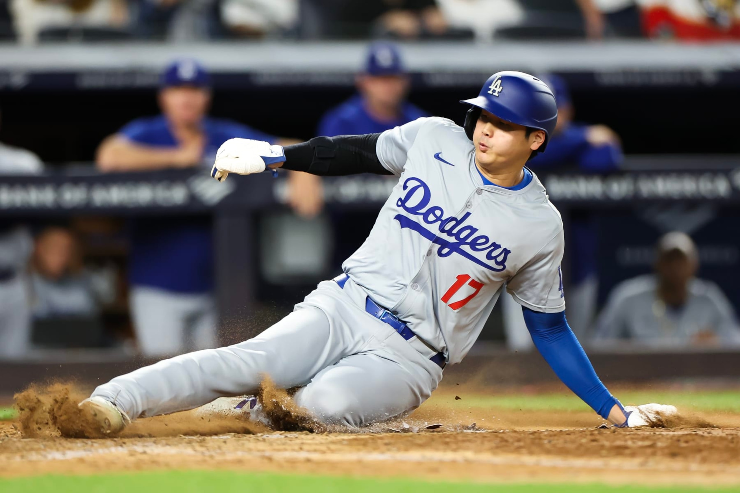 NEW YORK, NEW YORK - JUNE 09: Shohei Ohtani #17 of the Los Angeles Dodgers slides safely into home plate during the eighth inning against the New York Yankees at Yankee Stadium on June 09, 2024 in the Bronx borough of New York City. (Photo by Luke Hales/Getty Images) NEW YORK, NEW YORK - JUNE 09: Shohei Ohtani #17 of the Los Angeles Dodgers slides safely into home plate during the eighth inning against the New York Yankees at Yankee Stadium on June 09, 2024 in the Bronx borough of New York City. (Photo by Luke Hales/Getty Images)