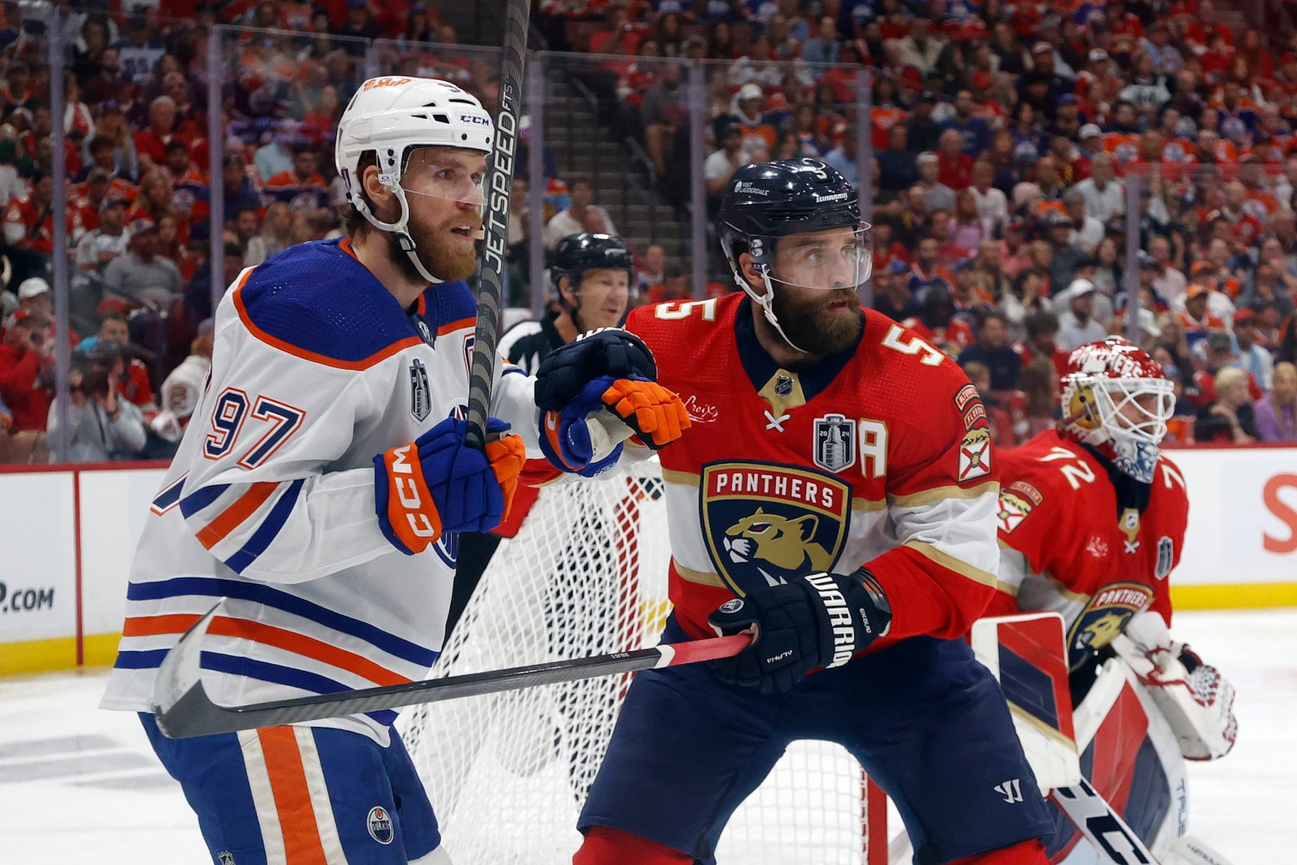 SUNRISE, FL - JUNE 8: Aaron Ekblad #5 of the Florida Panthers defends against Connor McDavid #97 of the Edmonton Oilers in Game One of the Final of the 2024 Stanley Cup Playoffs at the Amerant Bank Arena on June 8, 2024 in Sunrise, Florida. (Photo by Joel Auerbach/Getty Images) SUNRISE, FL - JUNE 8: Aaron Ekblad #5 of the Florida Panthers defends against Connor McDavid #97 of the Edmonton Oilers in Game One of the Final of the 2024 Stanley Cup Playoffs at the Amerant Bank Arena on June 8, 2024 in Sunrise, Florida. (Photo by Joel Auerbach/Getty Images)