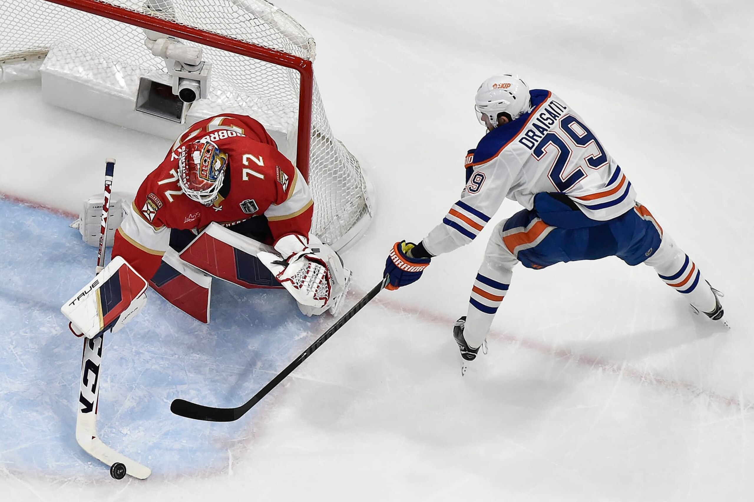 SUNRISE, FLORIDA - JUNE 8: Goaltender Sergei Bobrovsky #72 of the Florida Panthers defends the net against Leon Draisaitl #29 of the Edmonton Oilers in Game One of the Stanley Cup Final at the Amerant Bank Arena on June 8, 2024 in Sunrise, Florida. (Photo by Eliot J. Schechter/NHLI via Getty Images) SUNRISE, FLORIDA - JUNE 8: Goaltender Sergei Bobrovsky #72 of the Florida Panthers defends the net against Leon Draisaitl #29 of the Edmonton Oilers in Game One of the Stanley Cup Final at the Amerant Bank Arena on June 8, 2024 in Sunrise, Florida. (Photo by Eliot J. Schechter/NHLI via Getty Images)