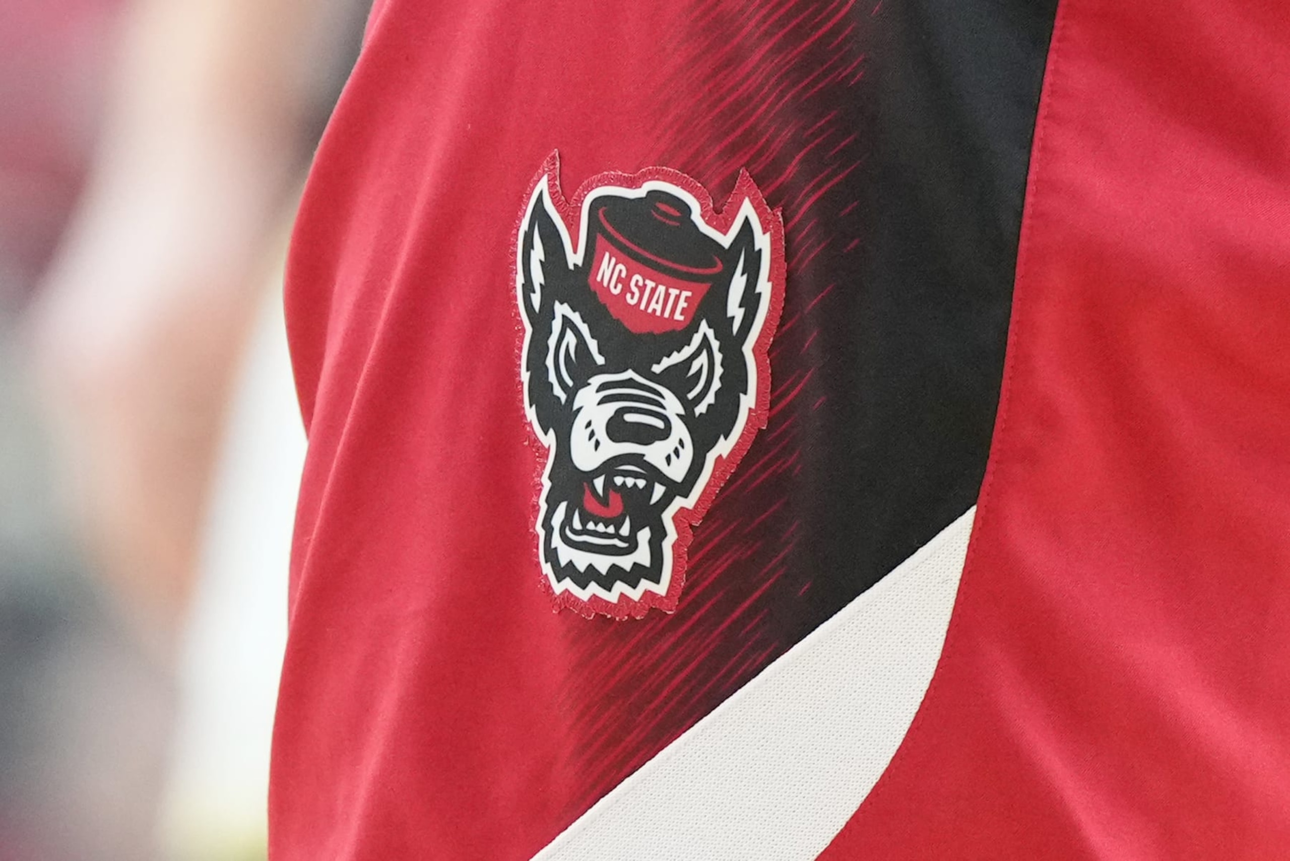 GLENDALE, ARIZONA - APRIL 06: The North Carolina State Wolfpack logo shown on a pair of shorts during the NCAA Mens Basketball Tournament Final Four semifinal game against the Purdue Boilermakers at State Farm Stadium on April 06, 2024 in Glendale, Arizona. (Photo by Mitchell Layton/Getty Images)
