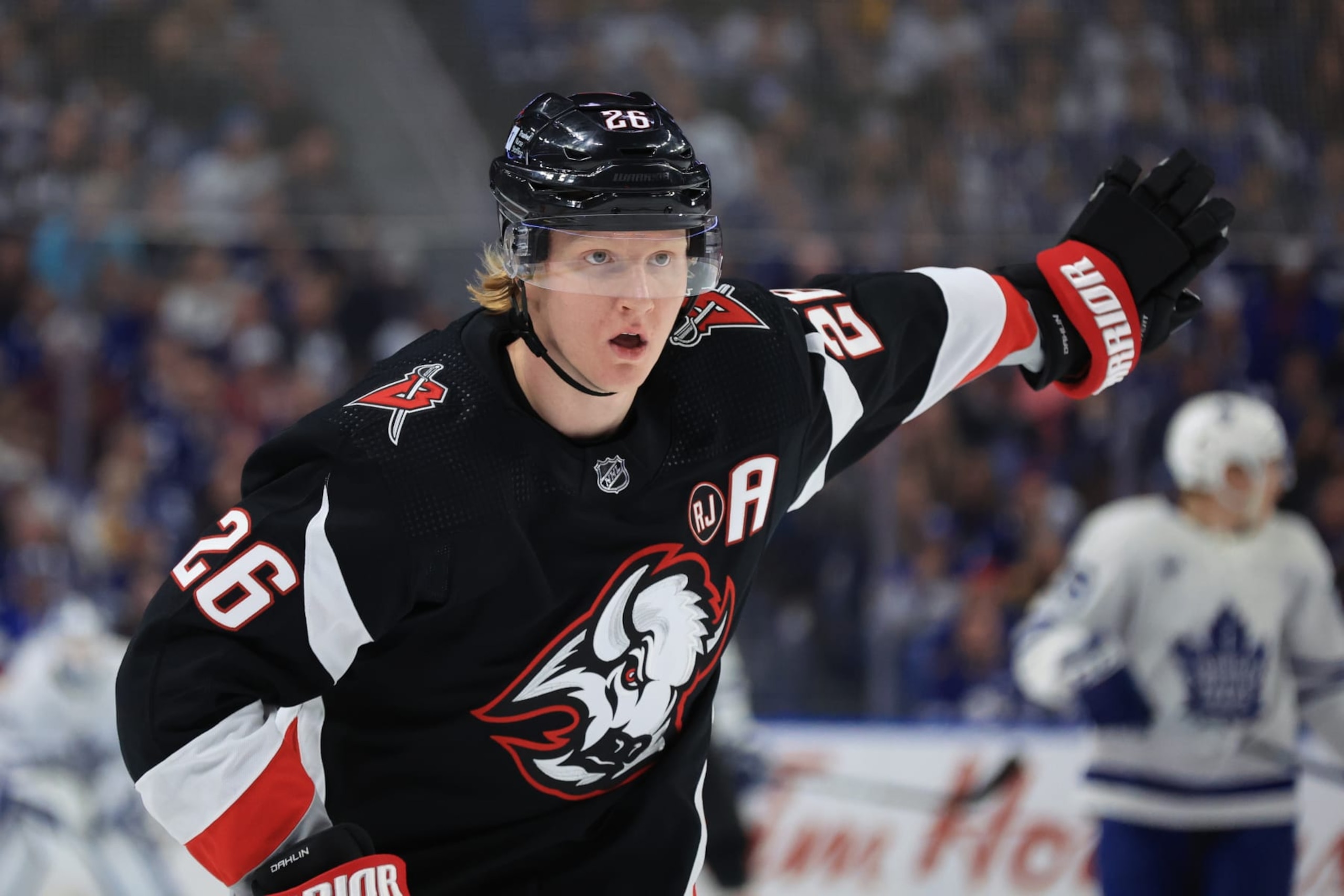 BUFFALO, NEW YORK - MARCH 30: Rasmus Dahlin #26 of the Buffalo Sabres motions to teammates during an NHL game against the Toronto Maple Leafs on March 30, 2024 at KeyBank Center in Buffalo, New York. (Photo by Bill Wippert/NHLI via Getty Images)