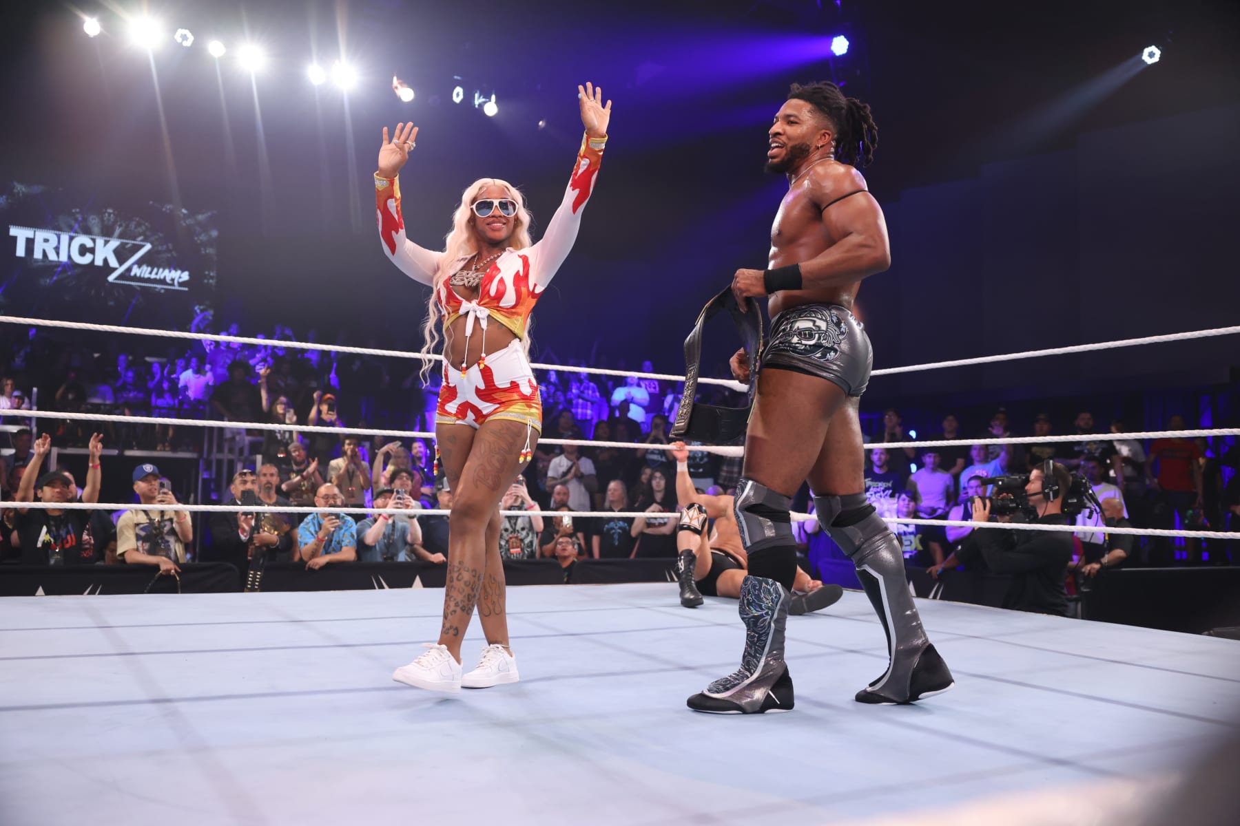 LAS VEGAS, NEVADA - JUNE 9: Sexyy Red celebrates with Trick Williams during NXT Battleground at UFC APEX on June 9, 2024 in Las Vegas, Nevada.  (Photo by WWE/Getty Images)