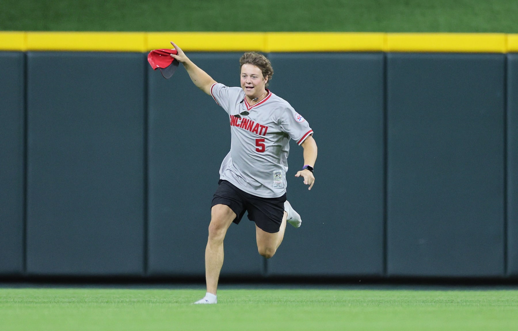 CINCINNATI, OHIO - JUNE 11: An unidentified fan runs on the field before the ninth inning of the Cincinnati Reds against Cleveland Guardians at Great American Ball Park on June 11, 2024 in Cincinnati, Ohio. (Photo by Andy Lyons/Getty Images)