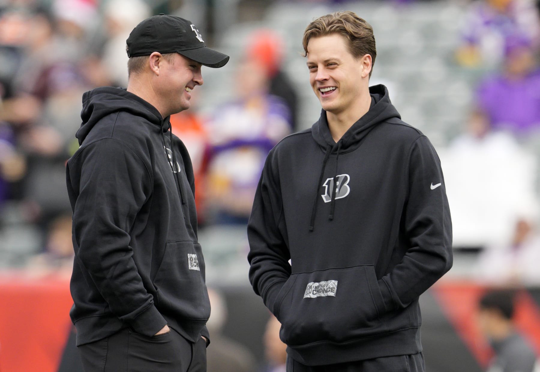 CINCINNATI, OHIO - DECEMBER 16: Joe Burrow (R) of the Cincinnati Bengals speaks with head coach Zac Taylor (L) before the game against the Minnesota Vikings at Paycor Stadium on December 16, 2023 in Cincinnati, Ohio. (Photo by Jeff Dean/Getty Images)
