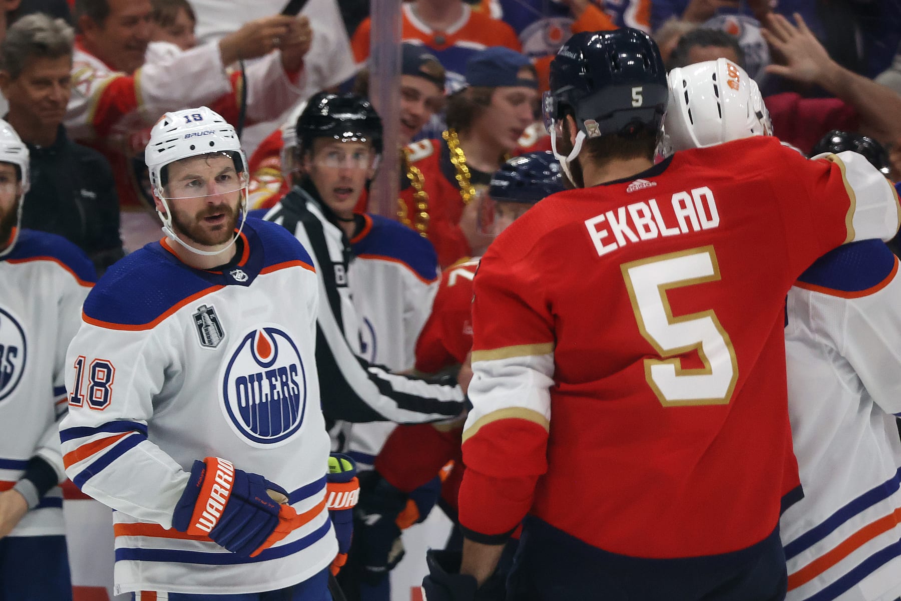 SUNRISE, FL - JUNE 10: Zach Hyman #18 of the Edmonton Oilers Aaron Ekblad #5 of the Florida Panthers exchange words during third period action in Game Two of the Final of the 2024 Stanley Cup Playoffs at the Amerant Bank Arena on June 10, 2024 in Sunrise, Florida. (Photo by Joel Auerbach/Getty Images)