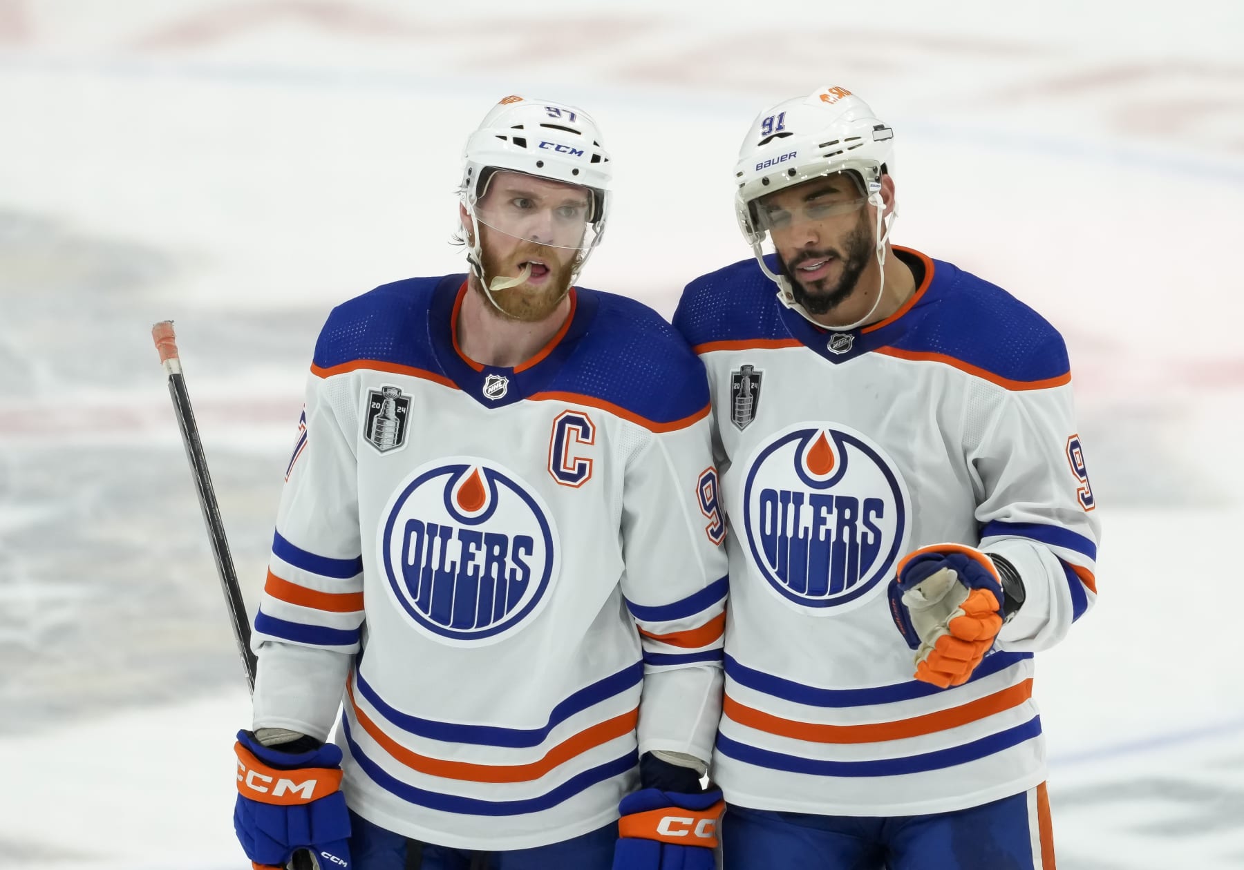 SUNRISE, FL - JUNE 10: Edmonton Oilers center Connor McDavid (97) land Edmonton Oilers left wing Evander Kane (91) during the NHL Stanley Cup Finals, Game 2 between the Florida Panthers and Edmonton Oilers on June 10th, 2024 at Amerant Bank Arena in Sunrise, FL. (Photo by Andrew Bershaw/Icon Sportswire via Getty Images)
