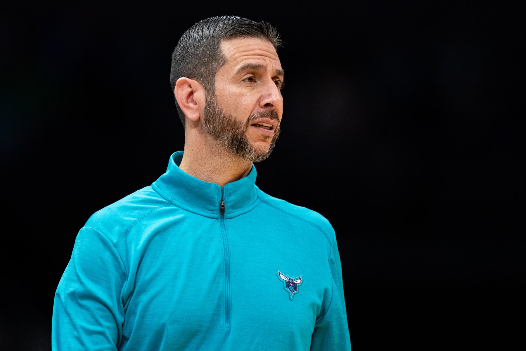 CHARLOTTE, NORTH CAROLINA - MARCH 09: James Borrego of the Charlotte Hornets looks on during their game against the Boston Celtics at Spectrum Center on March 09, 2022 in Charlotte, North Carolina. NOTE TO USER: User expressly acknowledges and agrees that, by downloading and or using this photograph, User is consenting to the terms and conditions of the Getty Images License Agreement. (Photo by Jacob Kupferman/Getty Images)