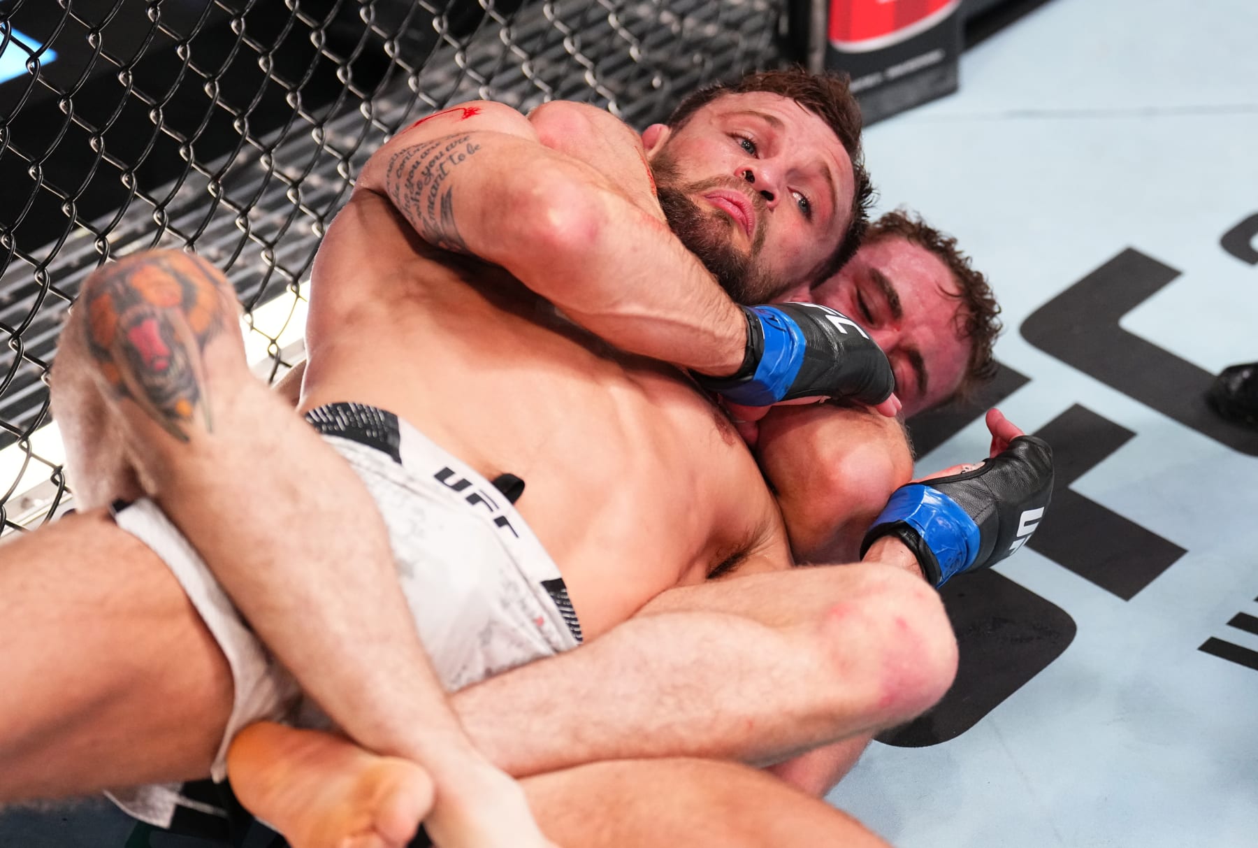 LAS VEGAS, NEVADA - JUNE 15: (R-L) Brady Hiestand secures a rear choke submission against Garrett Armfield in a bantamweight fight during the UFC Fight Night event at UFC APEX on June 15, 2024 in Las Vegas, Nevada. (Photo by Chris Unger/Zuffa LLC via Getty Images)