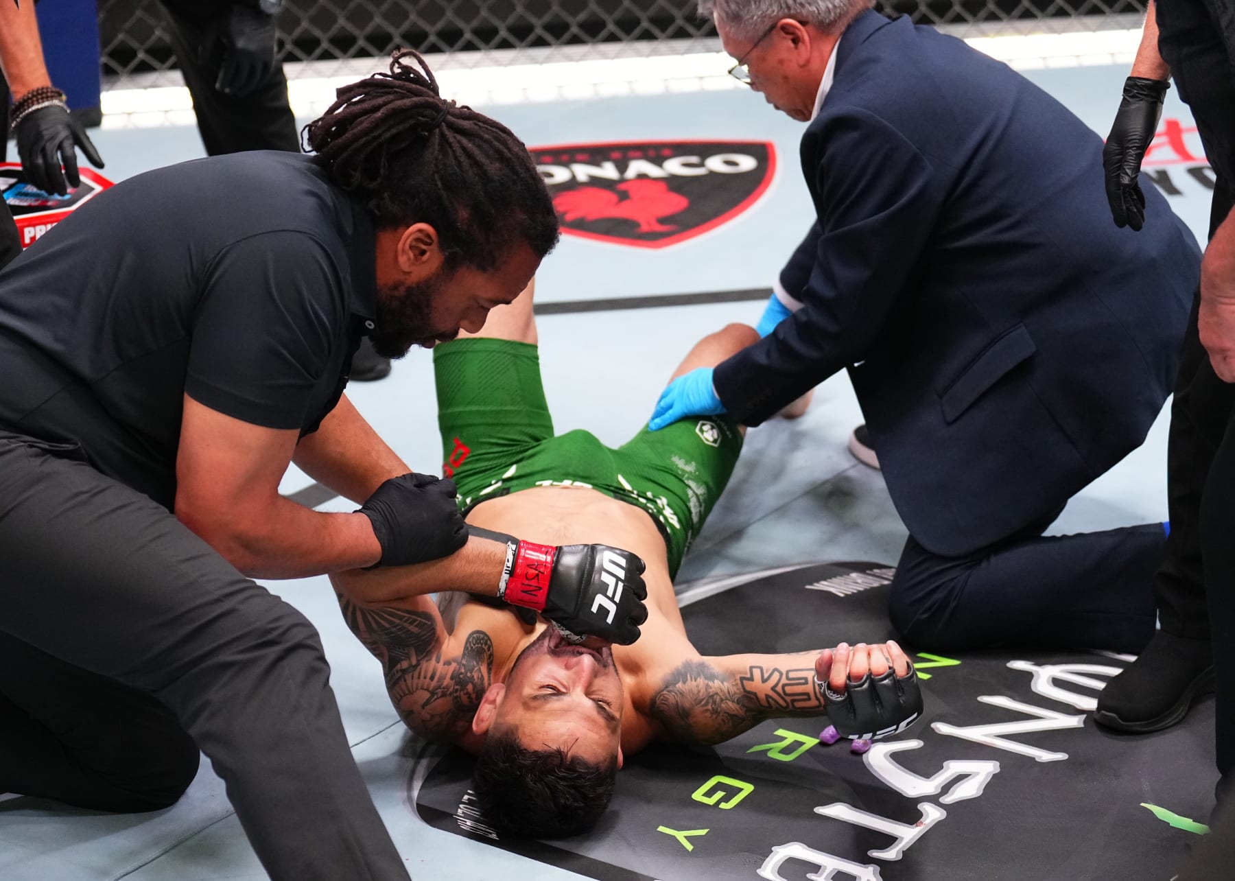 LAS VEGAS, NEVADA - JUNE 15: Alex Perez reacts after suffering a knee injury against Tatsuro Taira of Japan in a flyweight fight during the UFC Fight Night event at UFC APEX on June 15, 2024 in Las Vegas, Nevada. (Photo by Chris Unger/Zuffa LLC via Getty Images)