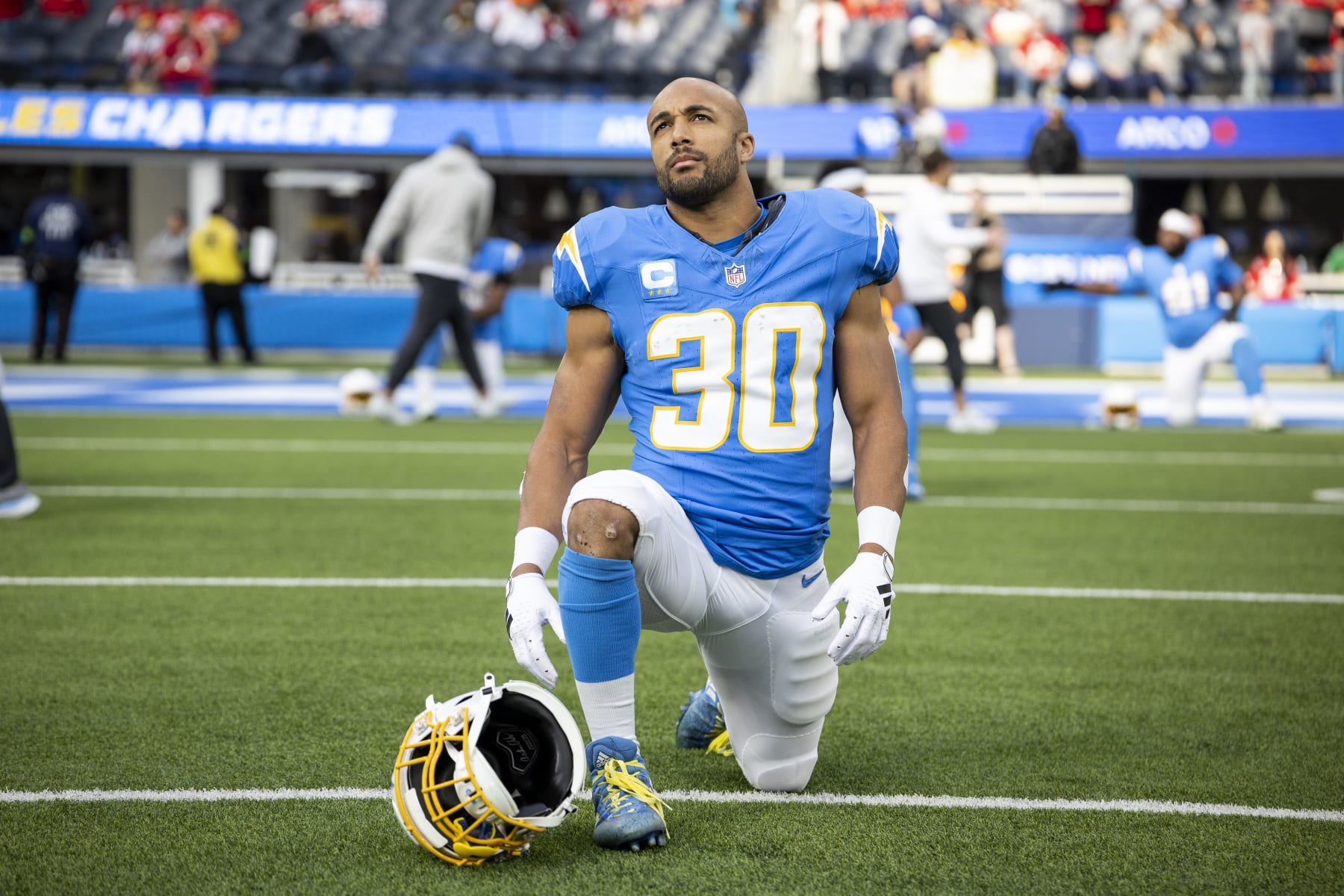INGLEWOOD, CALIFORNIA - JANUARY 07: Austin Ekeler #30 of the Los Angeles Chargers looks on as he stretches prior to an NFL football game between the Los Angeles Chargers and the Kansas City Chiefs at SoFi Stadium on January 07, 2024 in Inglewood, California. (Photo by Michael Owens/Getty Images)