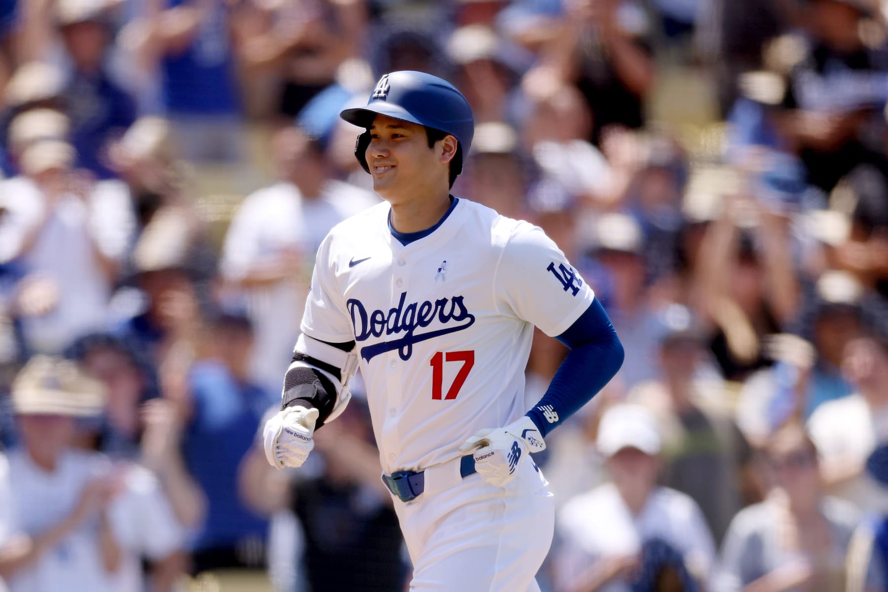 LOS ANGELES, CALIFORNIA - JUNE 16: Shohei Ohtani #17 of the Los Angeles Dodgers jogs to home plate after his home run during the sixth inning against the Kansas City Royals at Dodger Stadium on June 16, 2024 in Los Angeles, California. (Photo by Katelyn Mulcahy/Getty Images)